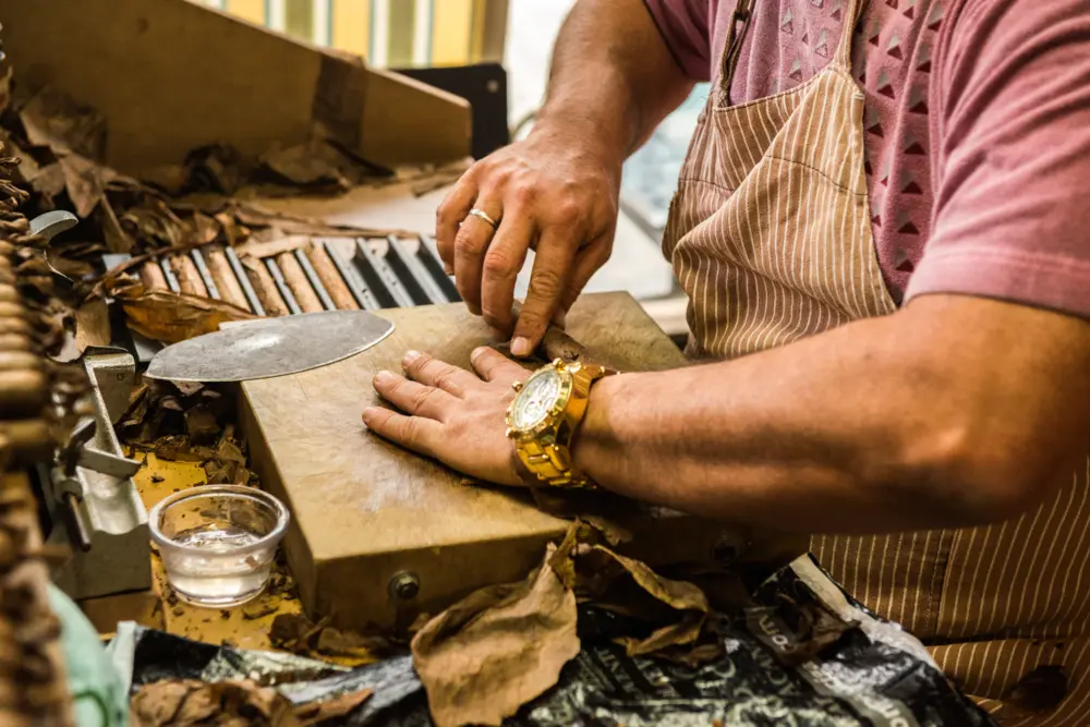 Man rolling cigars at a factory in Ybor City Florida