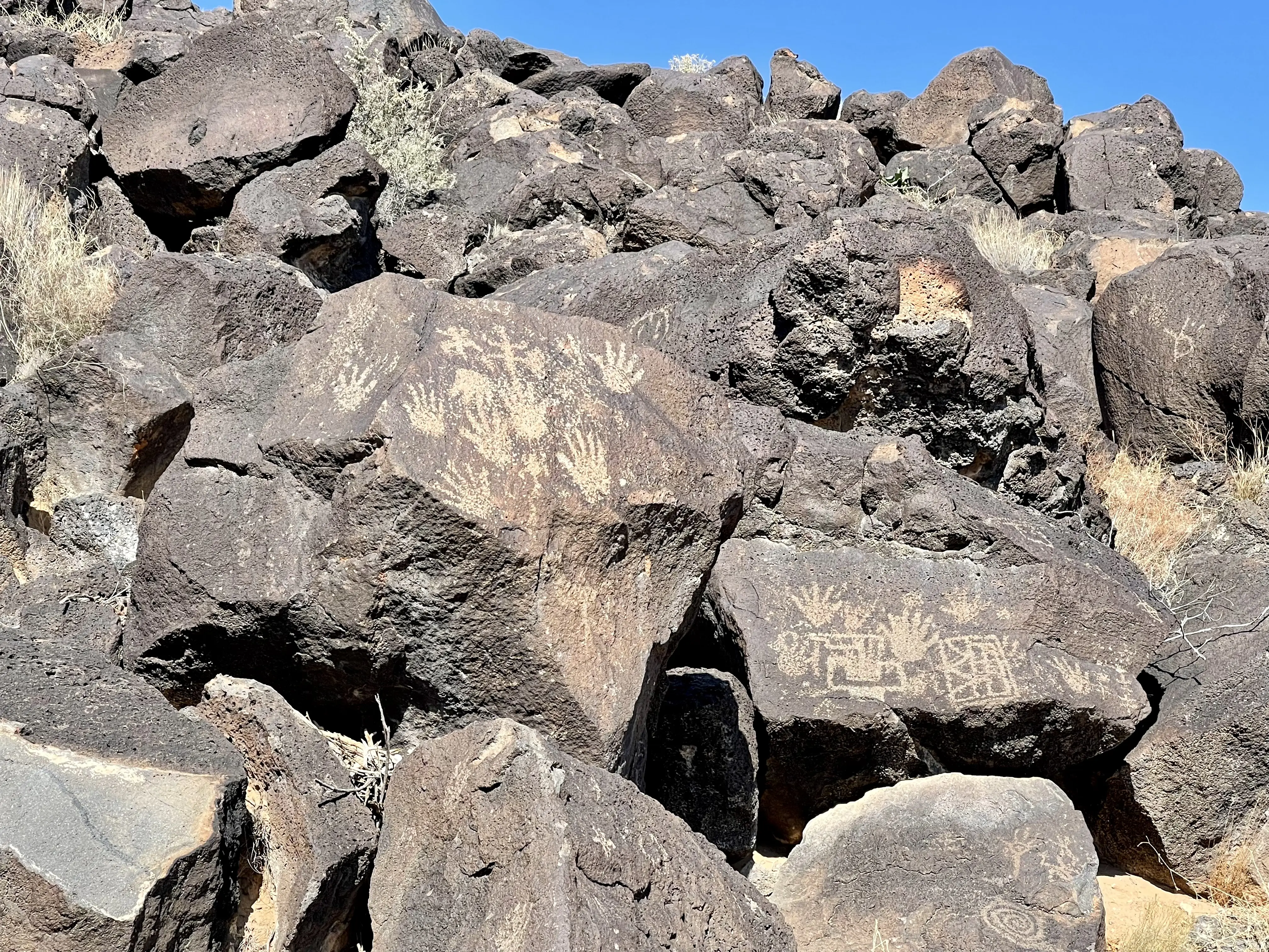 Outdoor image of Petroglyphs carved into rocks near Albuquerque.