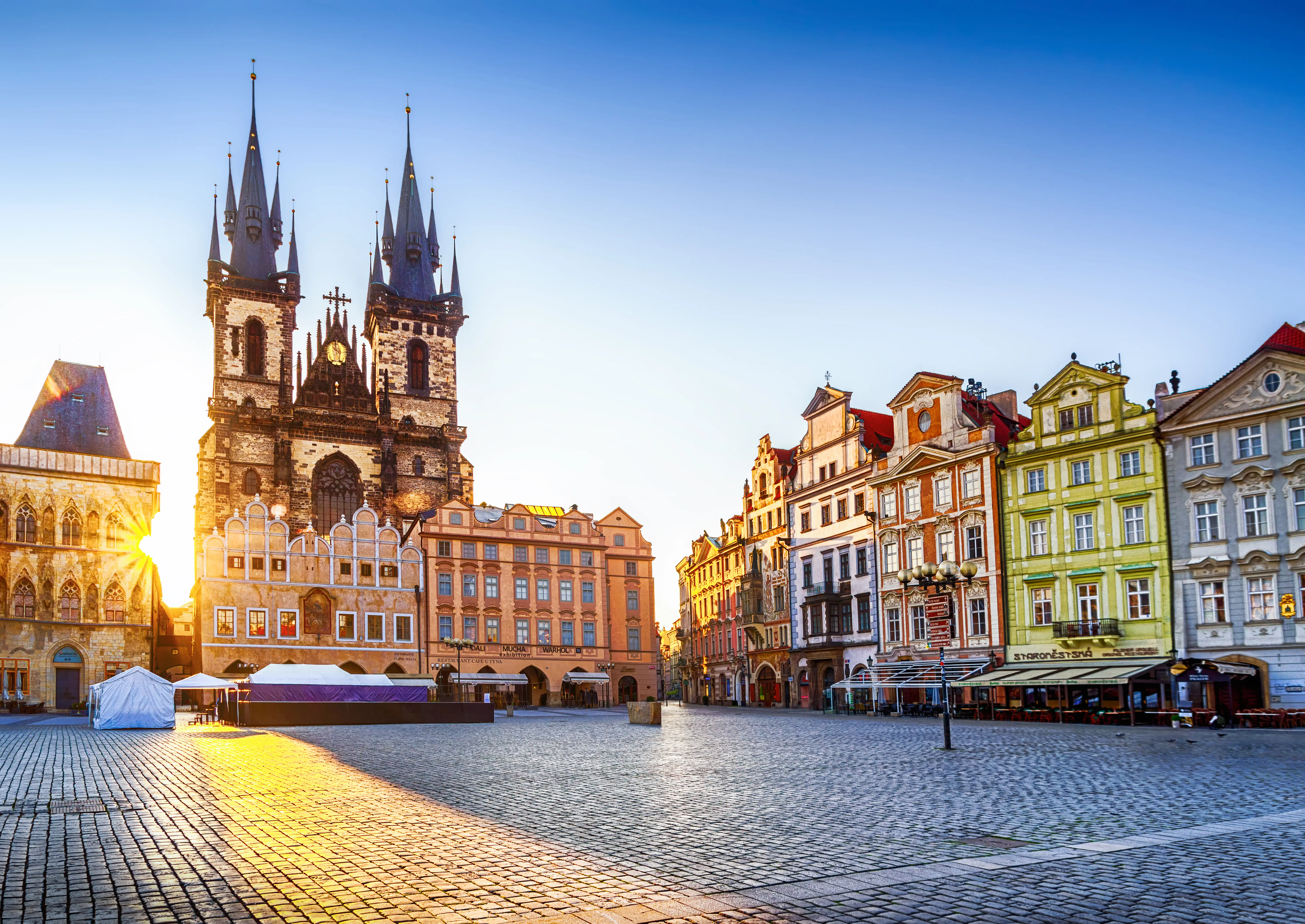 Sunrise image of Old Town Square in Prague, Czechia.