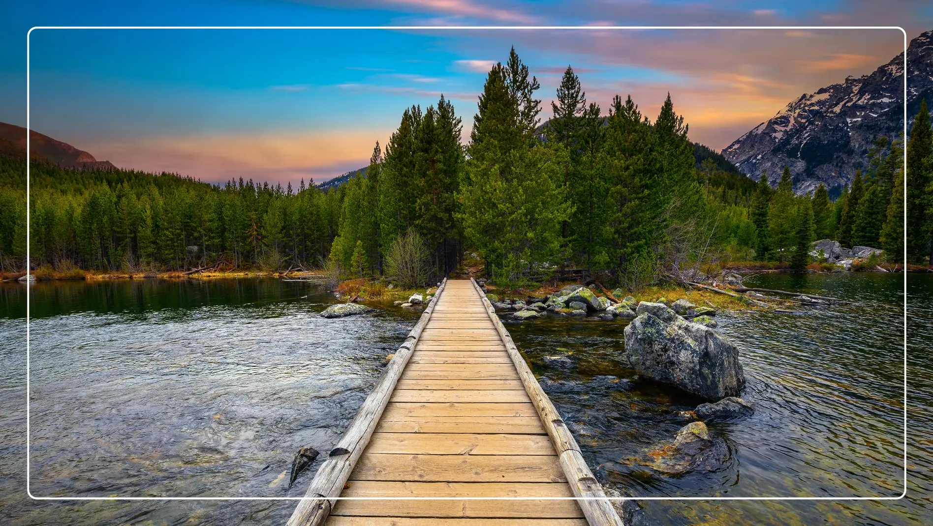 A wood bridge near a river in Jackson Hole, Wyoming.