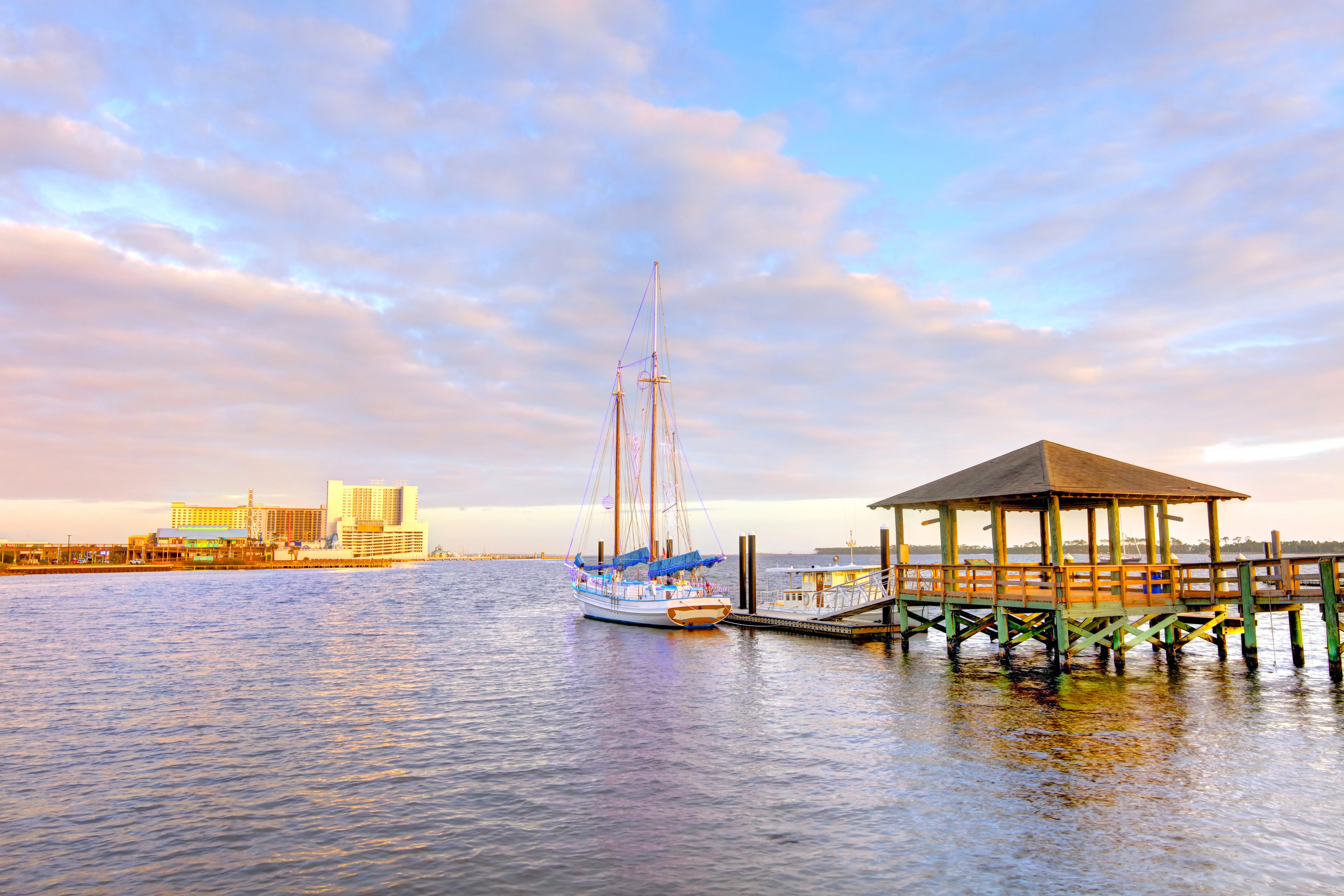 Boat dock in the Gulf Coast region with casinos in on the coastline