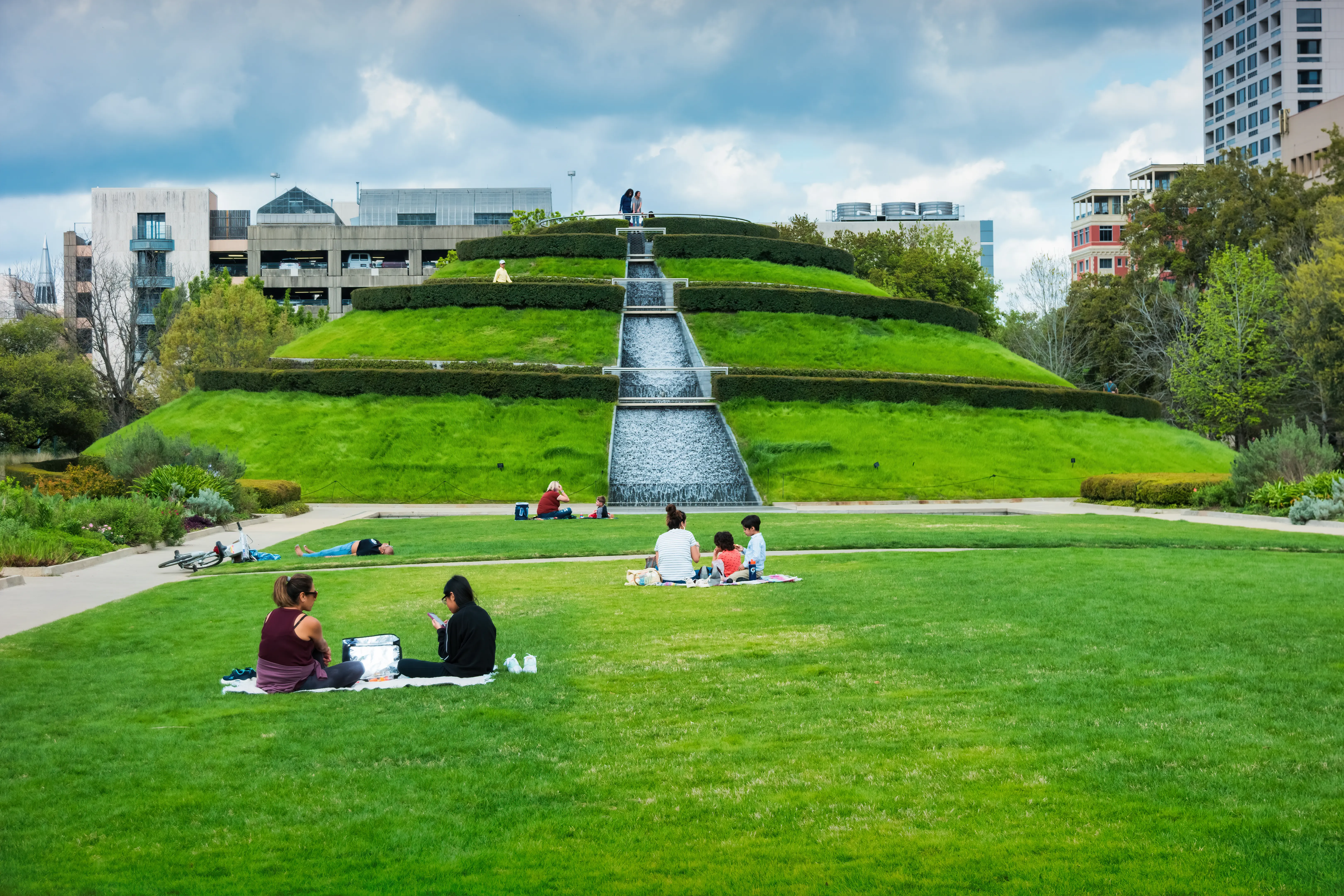 Image of parkgoers enjoying the grounds display at Hermann Park, in Houston Texas.