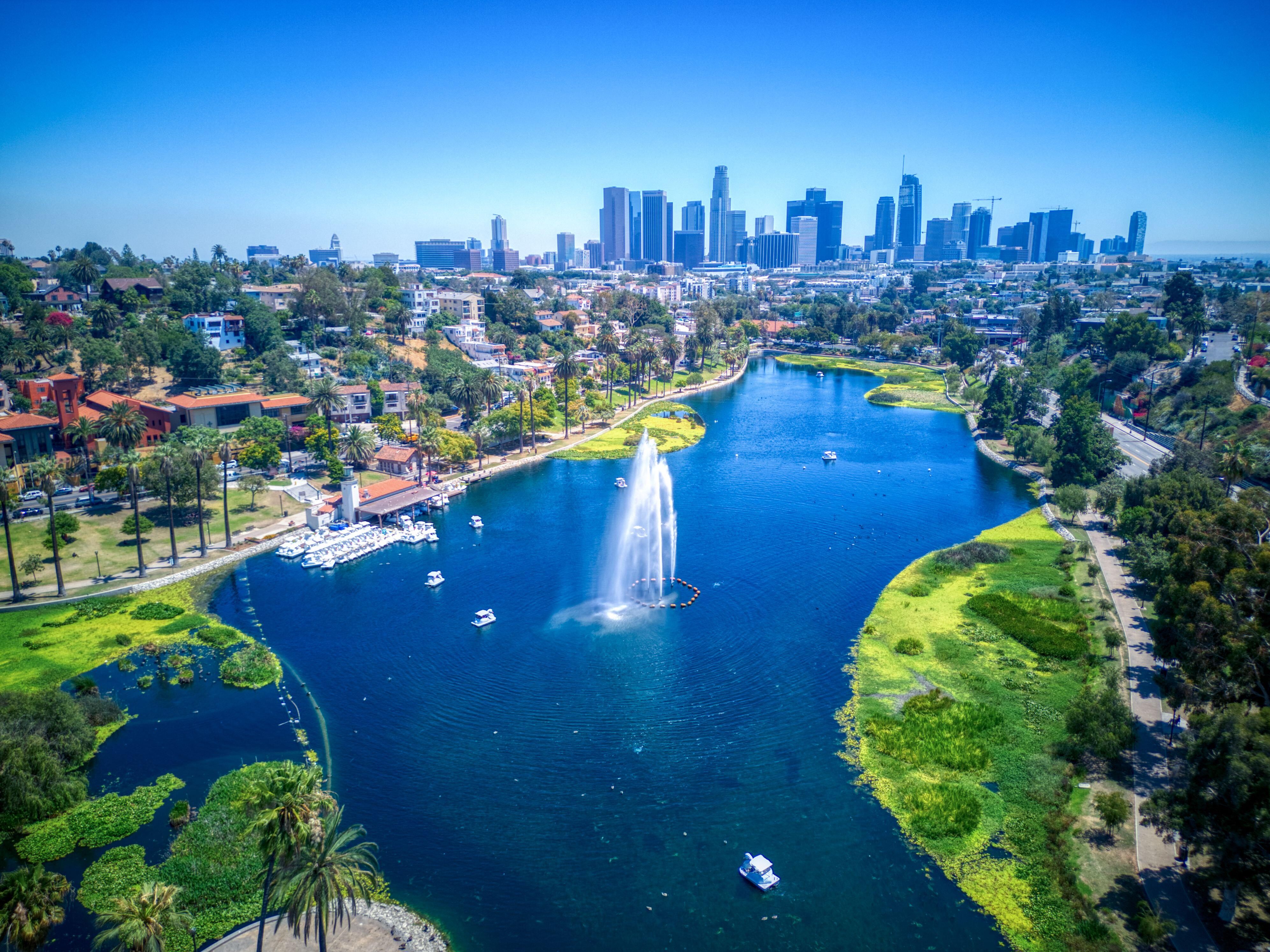 An aerial view of the Echo Park Lake near the downtown Los Angeles skyline