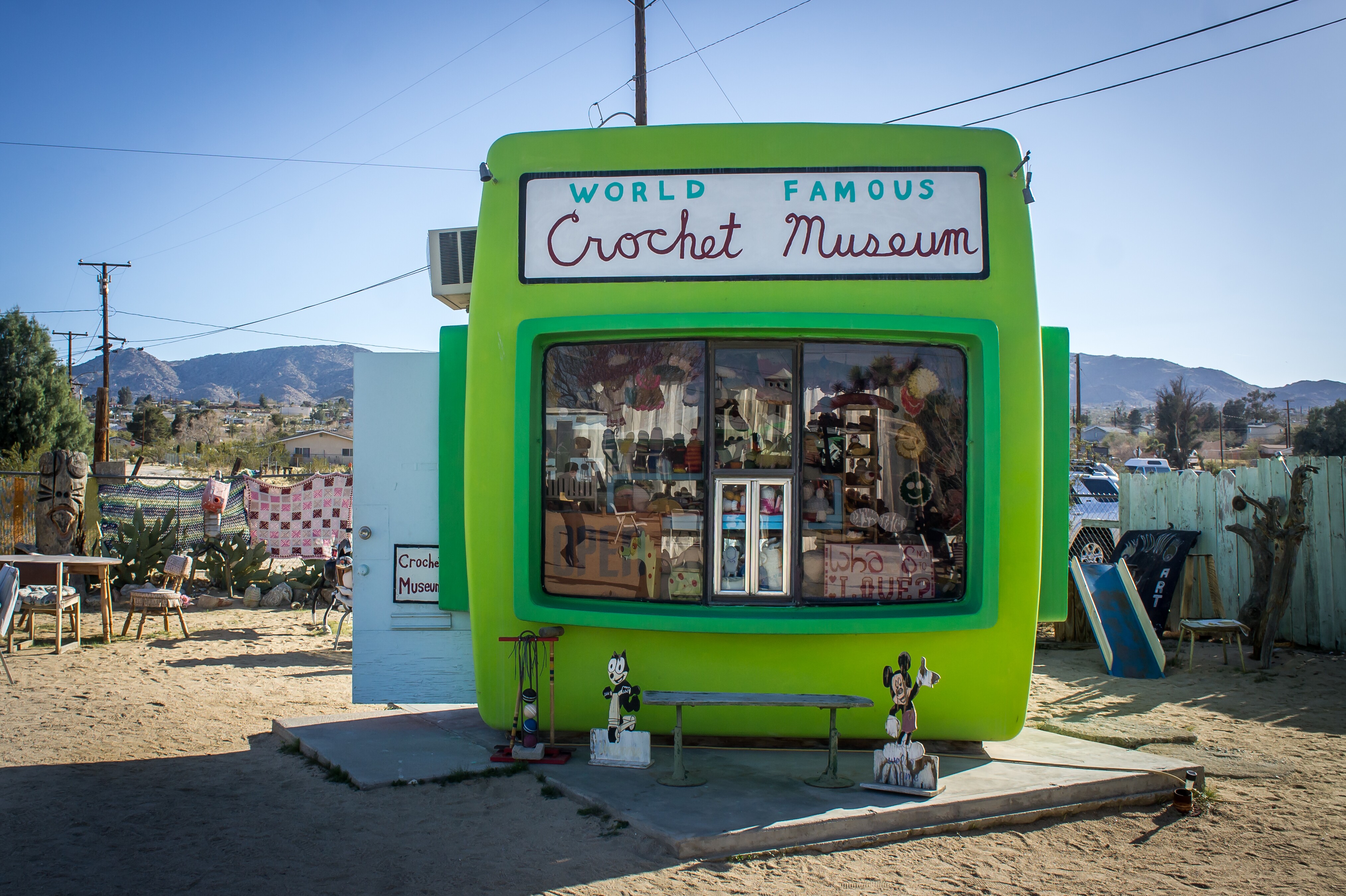 Image of the entrance sign for the Crochet Museum in Joshua Tree National Park.