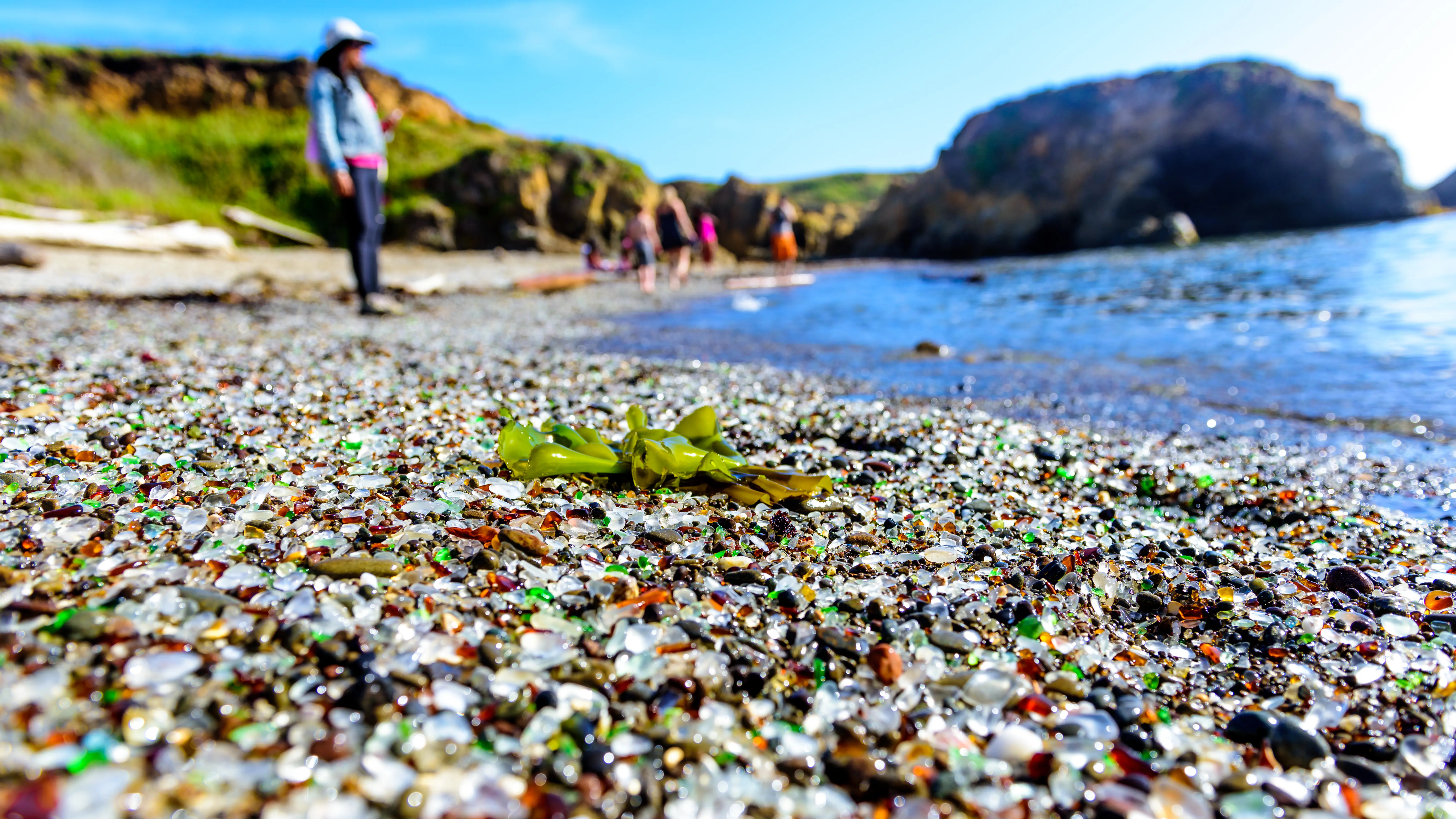 Outdoor closeup image of the sea glass covered shore of Glass Beach
