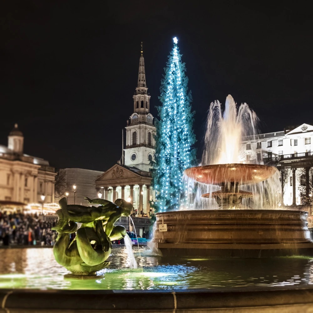 Christmas tree and fountain in Trafalgar Square, London, England