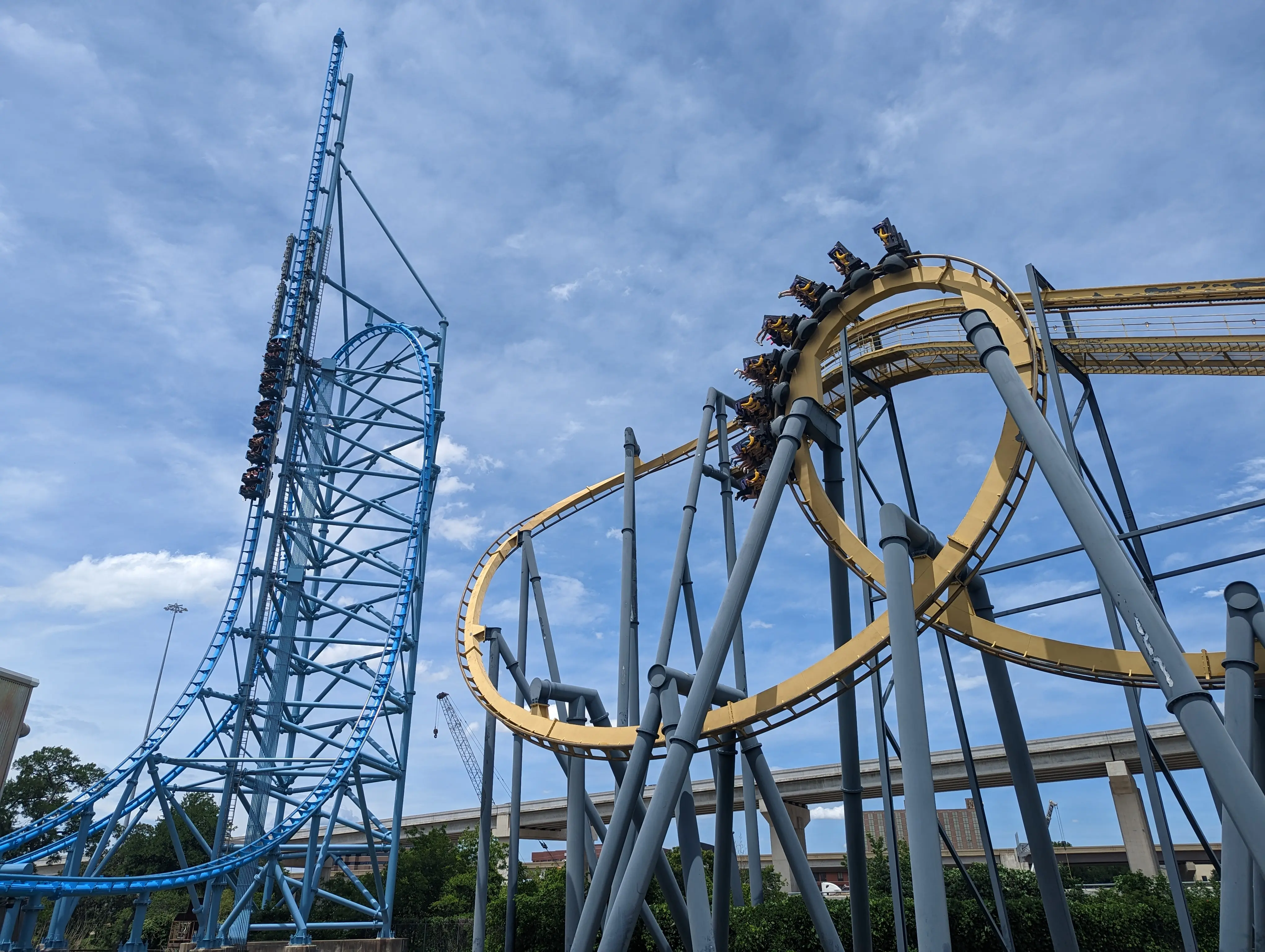 Image of various roller coasters, including Batman the Ride, at Six Flags Over Texas.