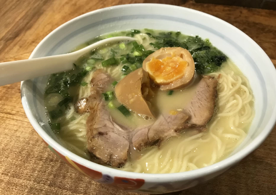 Bowl of ramen noodle soup with pork and an egg at Marutama Ramen in Vancouver British Columbia