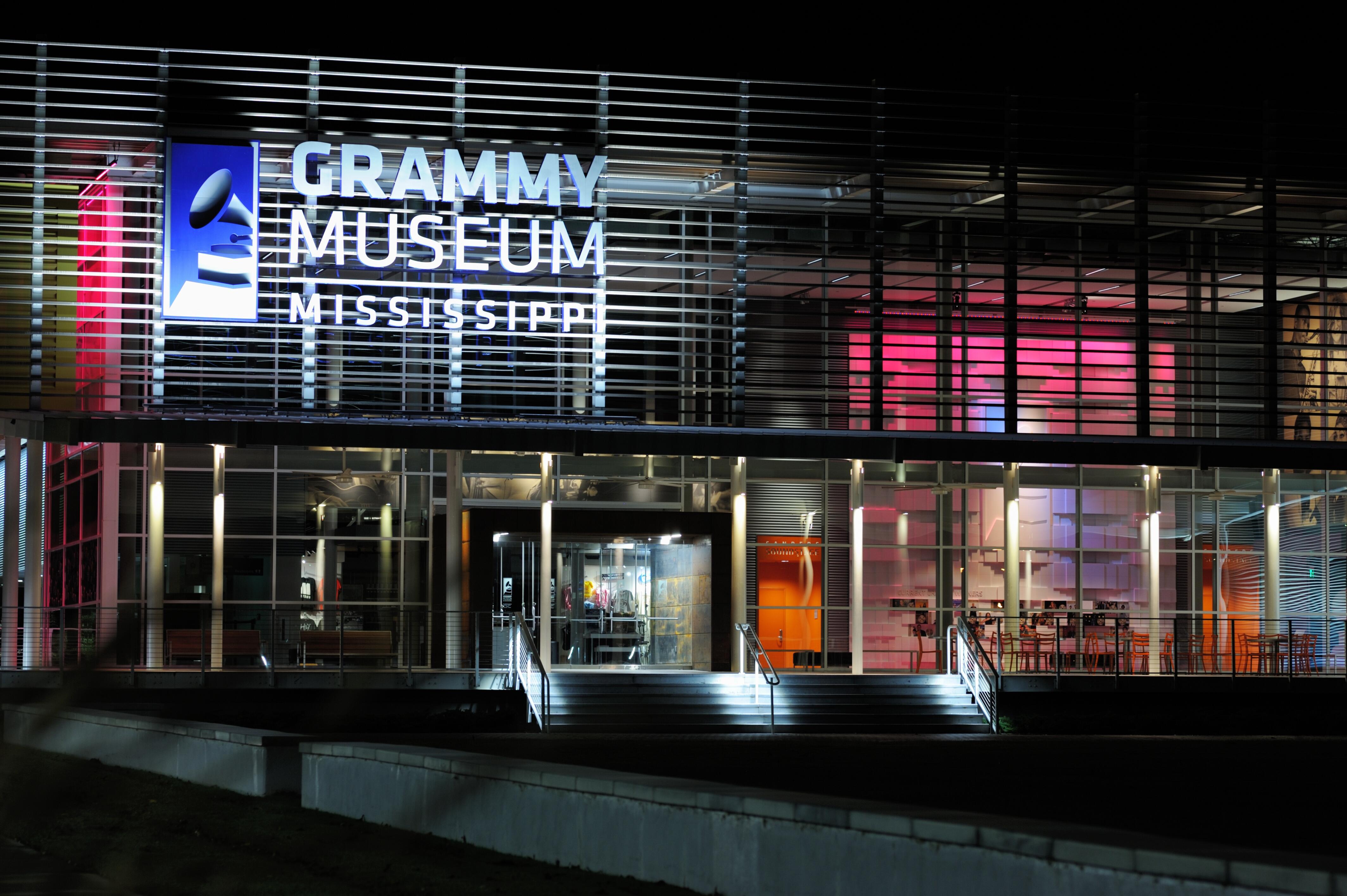 Nighttime exterior shot of the Grammy Museum in Los Angeles, California.