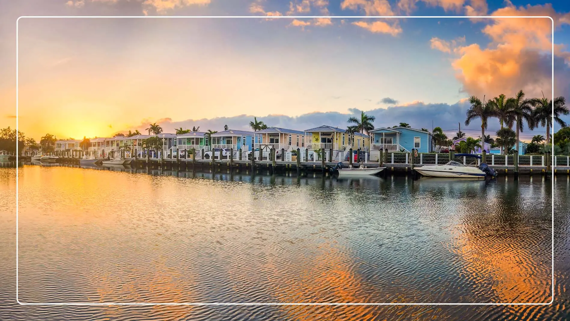 Colorful homes on the water in Key West at sunset.