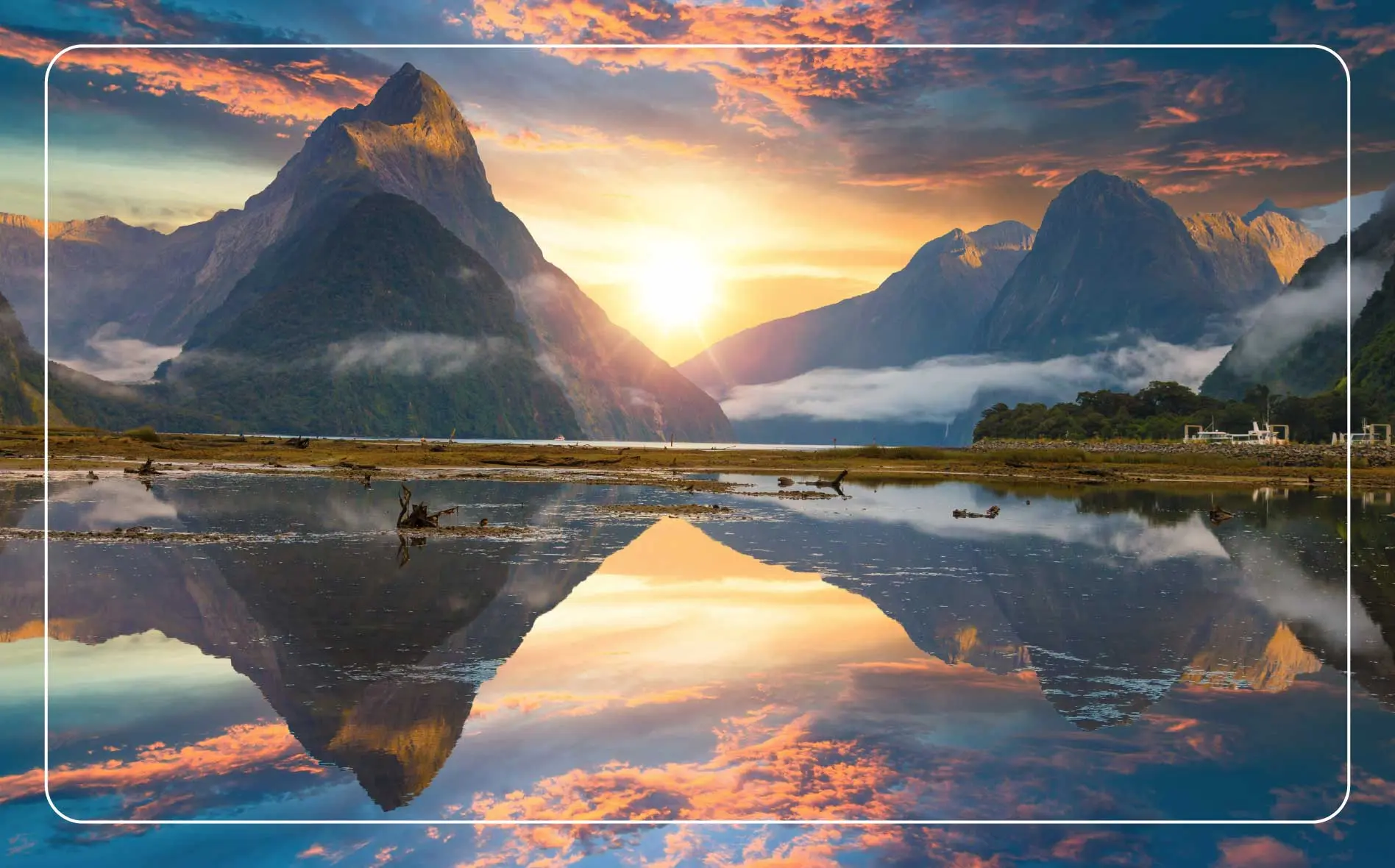 Famous Mitre Peak rising from the Milford Sound fiord at Fiordland National Park, New Zealand.