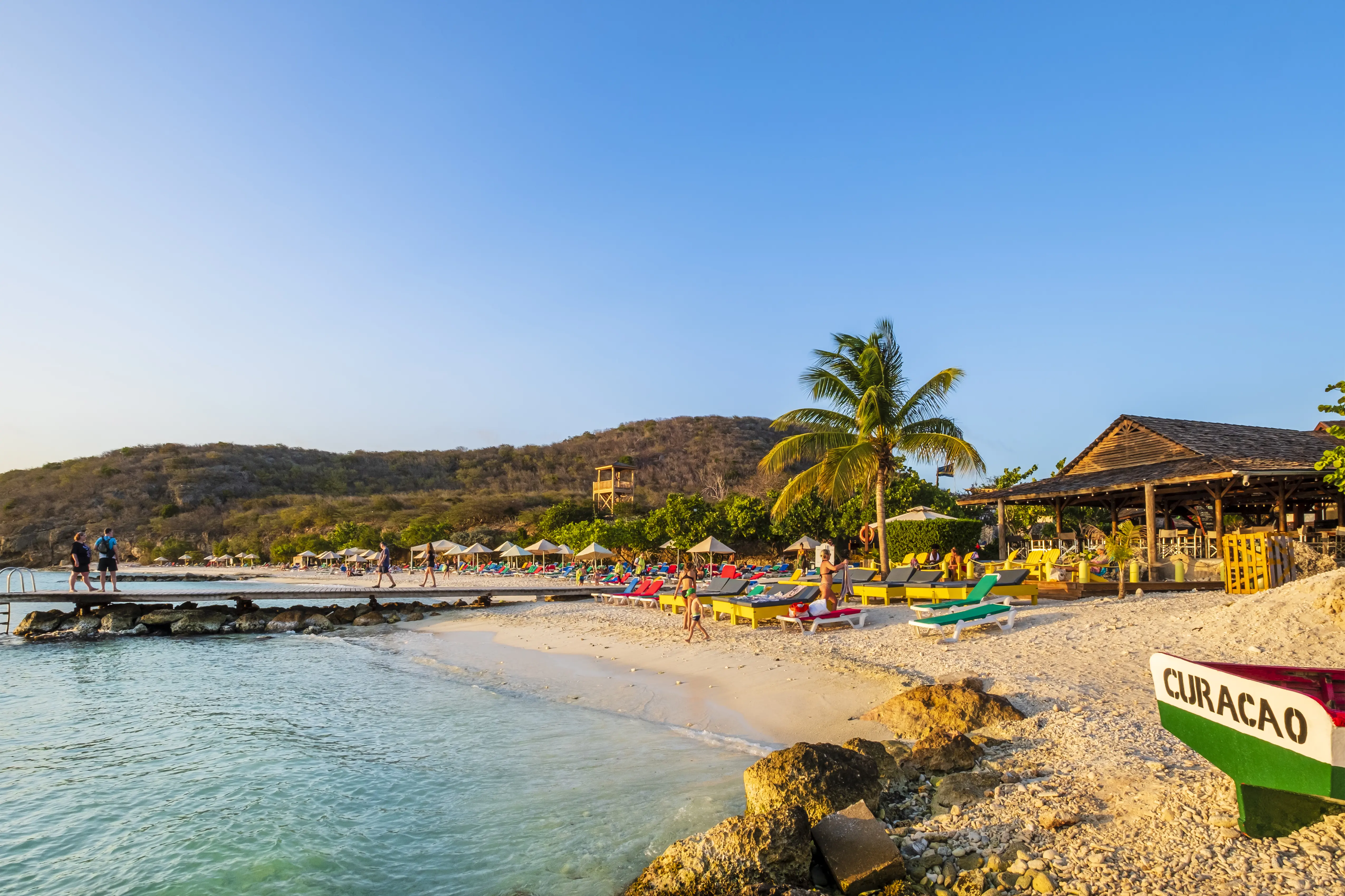 Image of the beach and surrounding view at Playa Porto Mari, Curaçao.