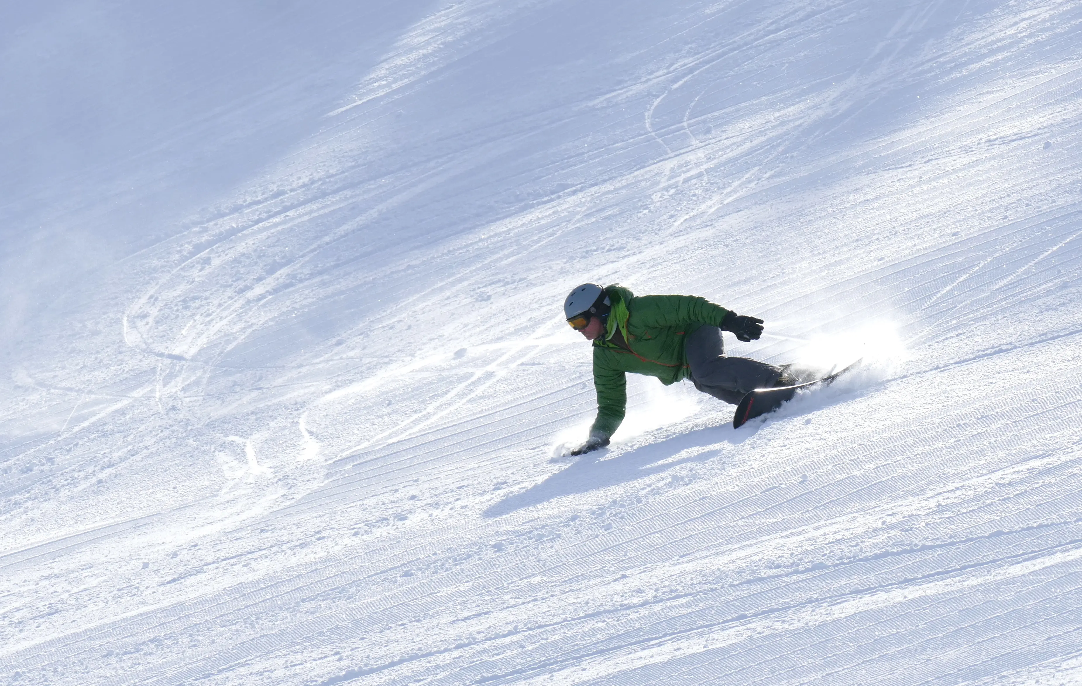 A snowboarder takes on Howelsen Hill