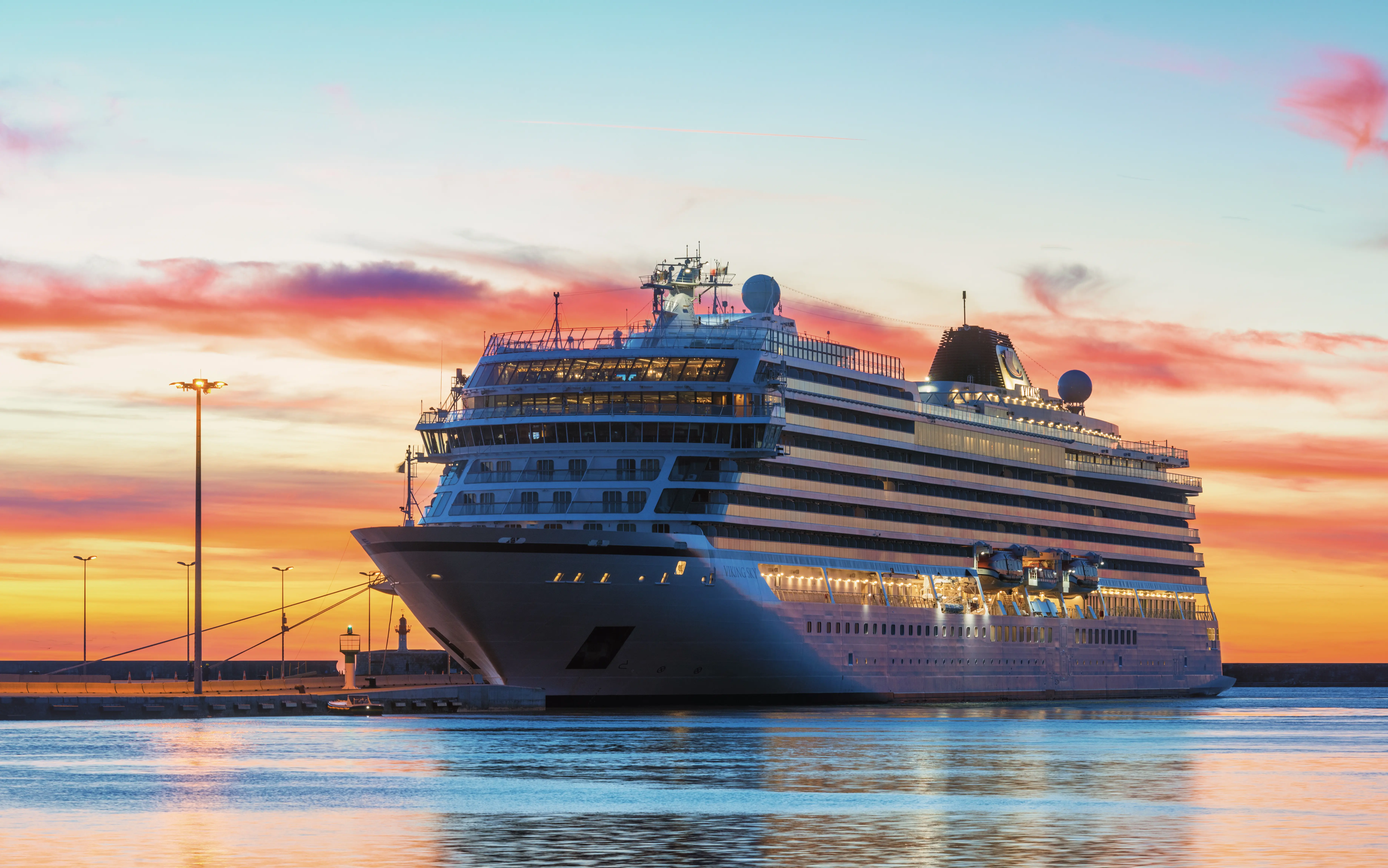 Image of the Viking Sky ship, moored in the harbor of Sète (Hérault, France) at sunset.
