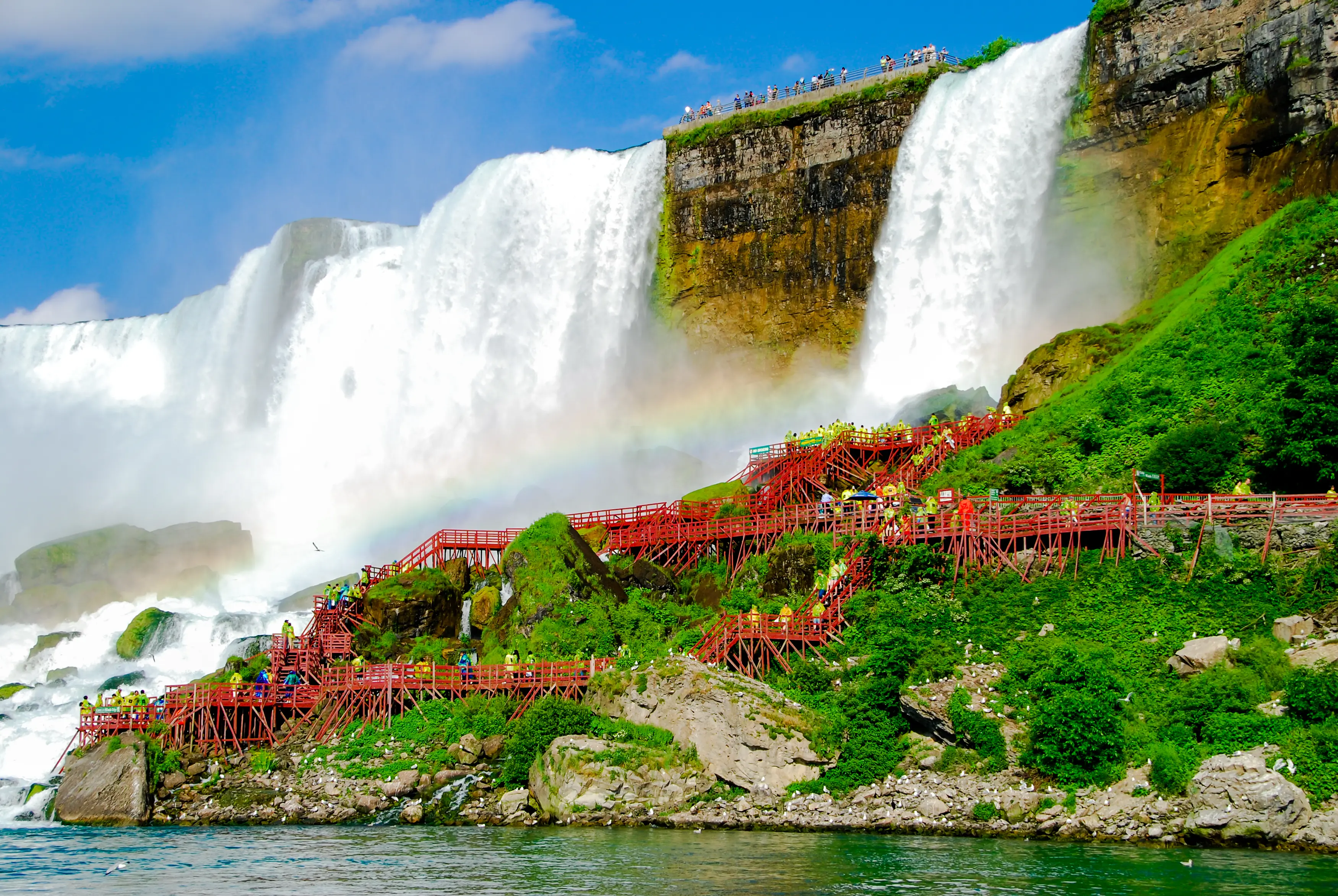 Tourists at base of Bridal Veil Falls/Cave of the Winds in Niagara Falls, USA