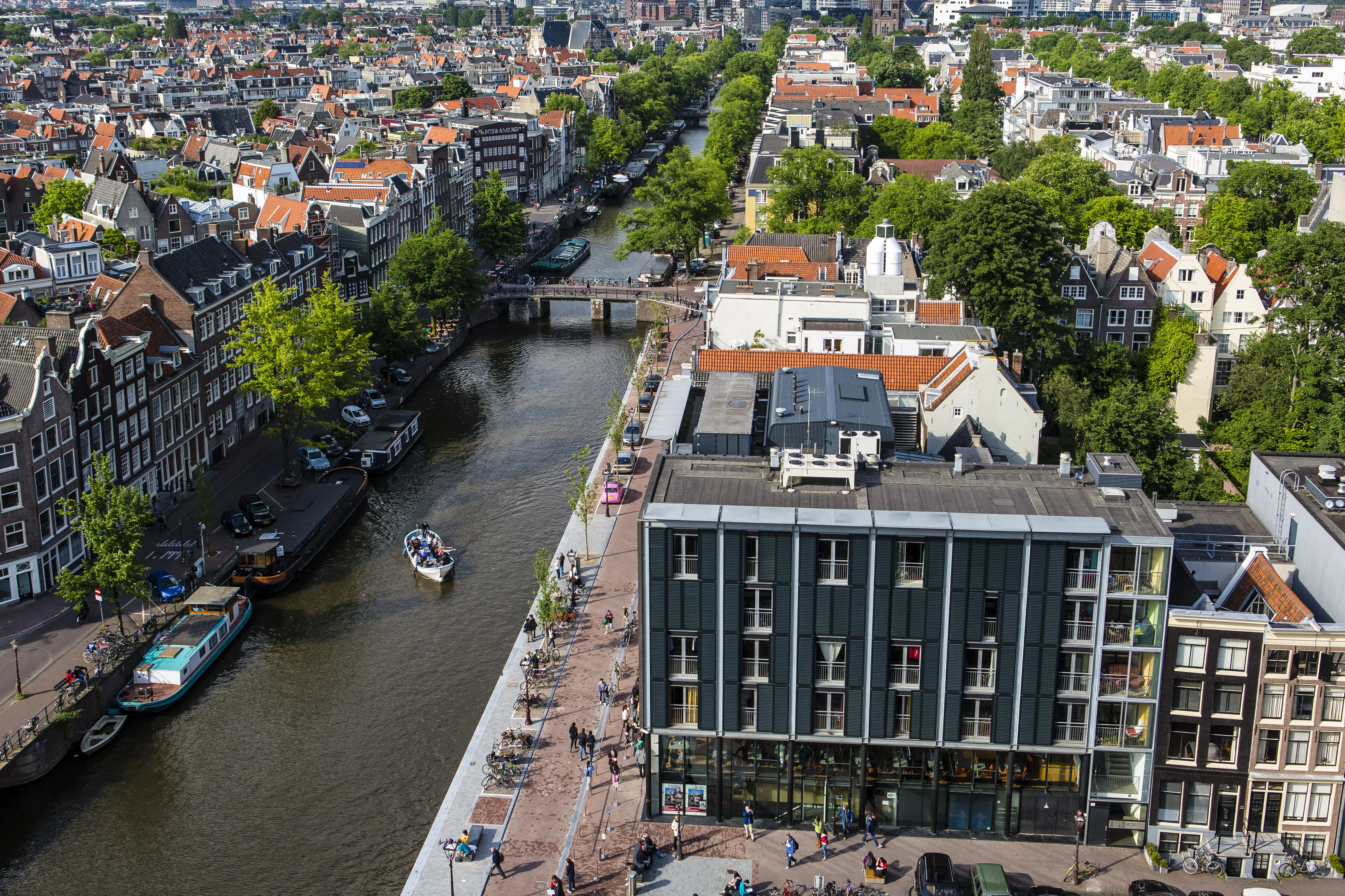 Exterior image of the Anne Frank House and Prinsengracht Canal.