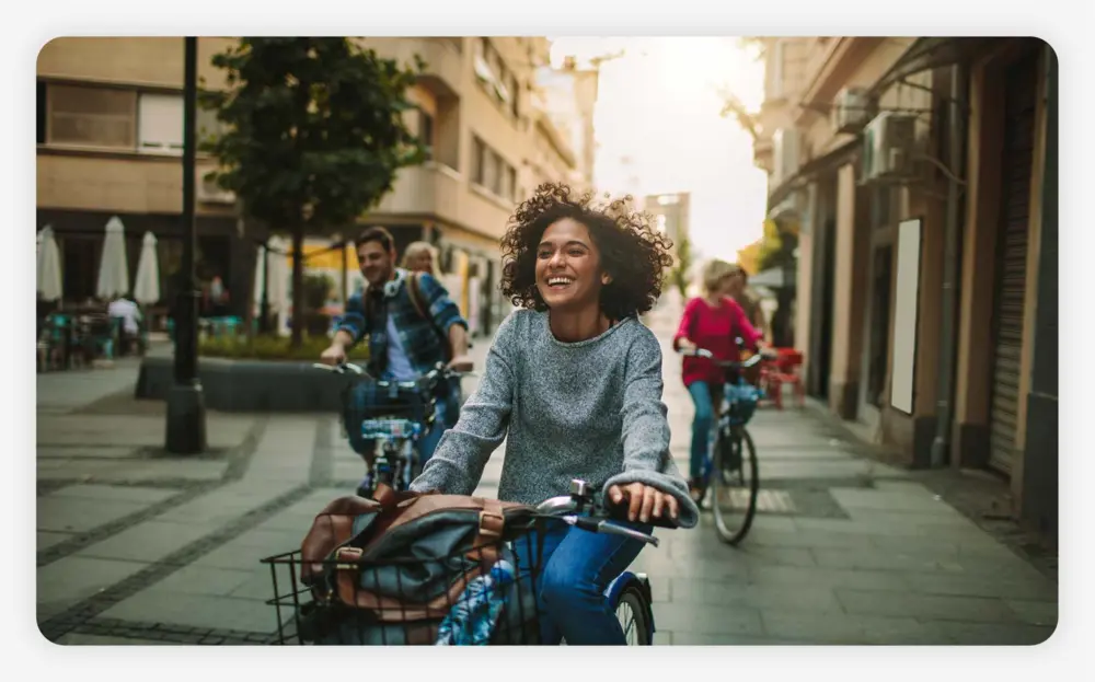 Group of young people exploring the city on bicycle