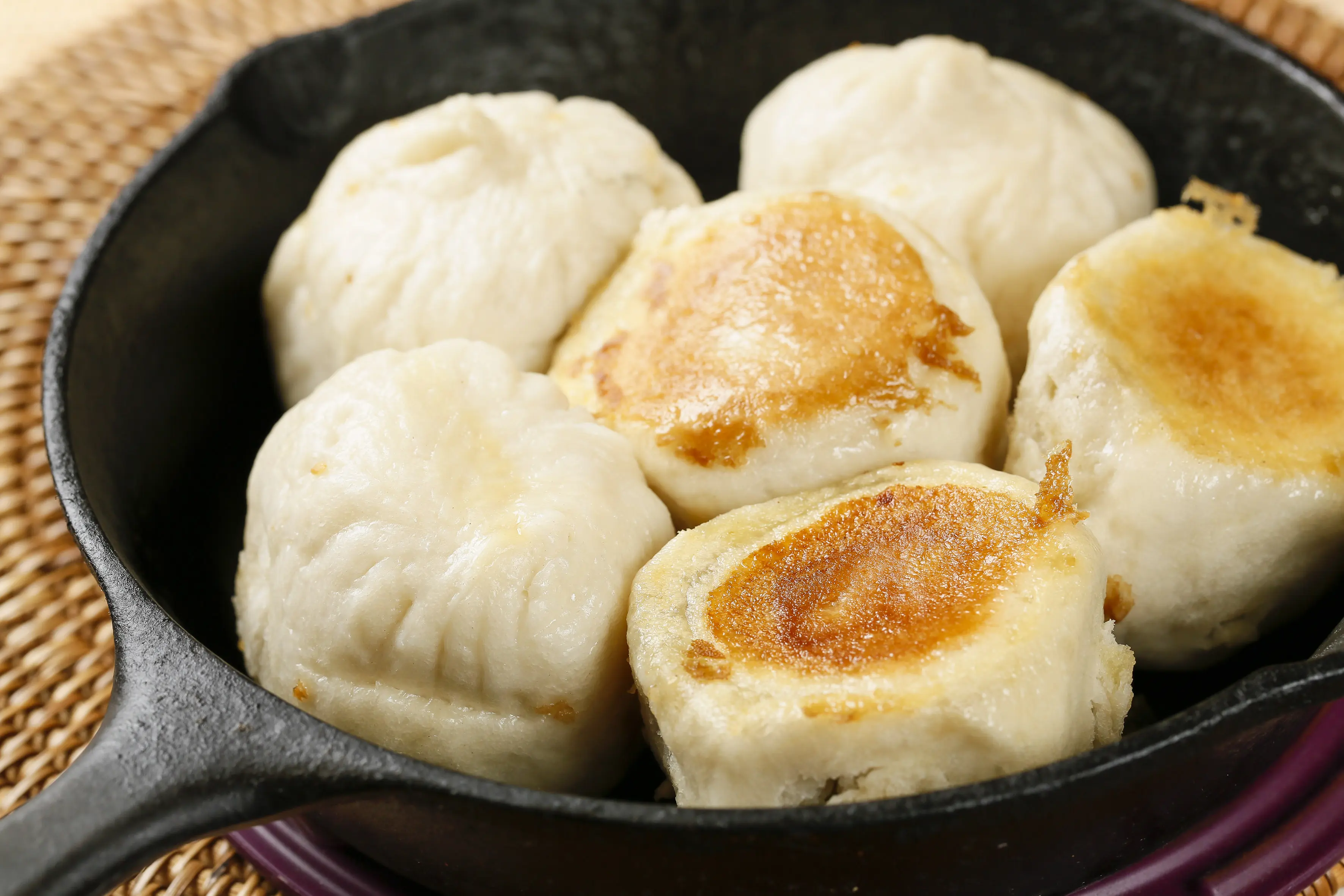 Image of a dish of pan-fried buns.