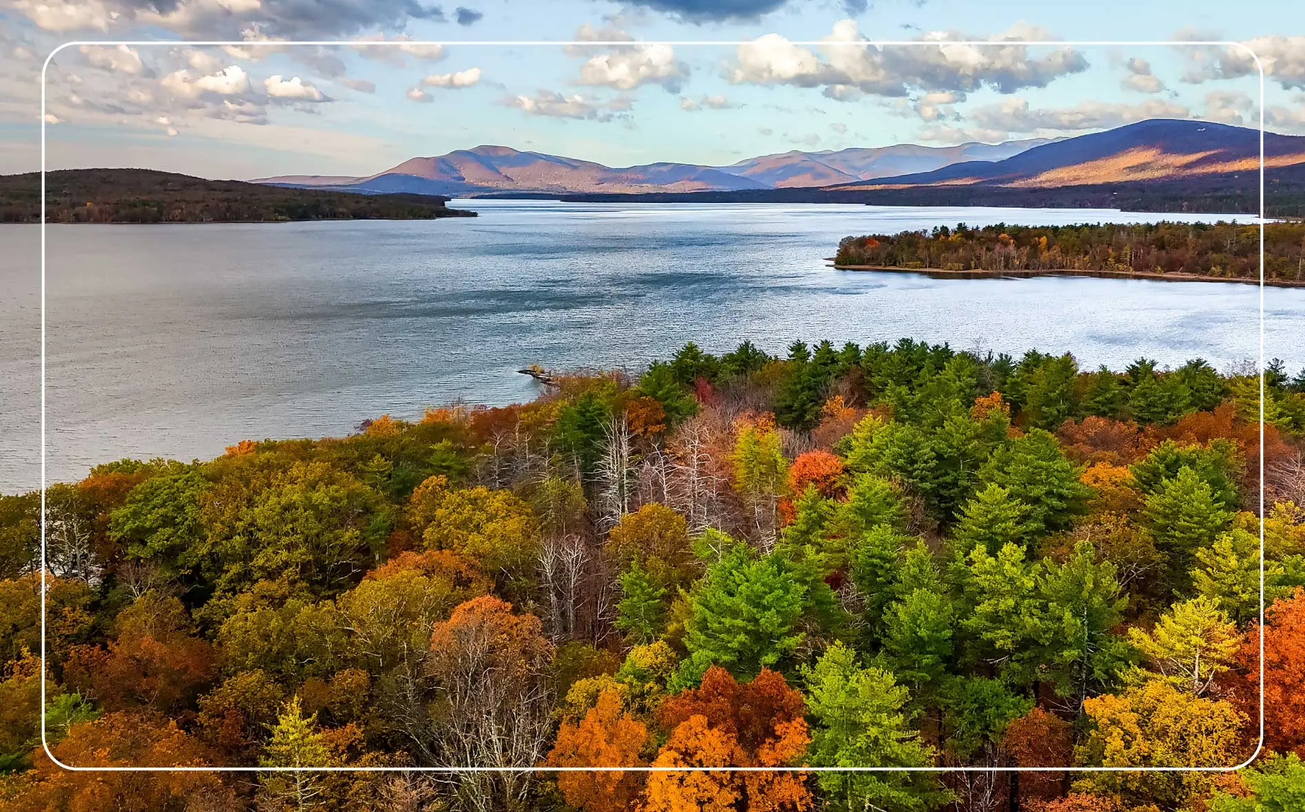 The rolling landscape and lush greenery of the Catskill Mountains.