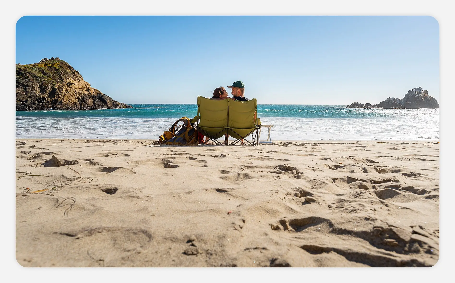 Couple sitting in beach chairs