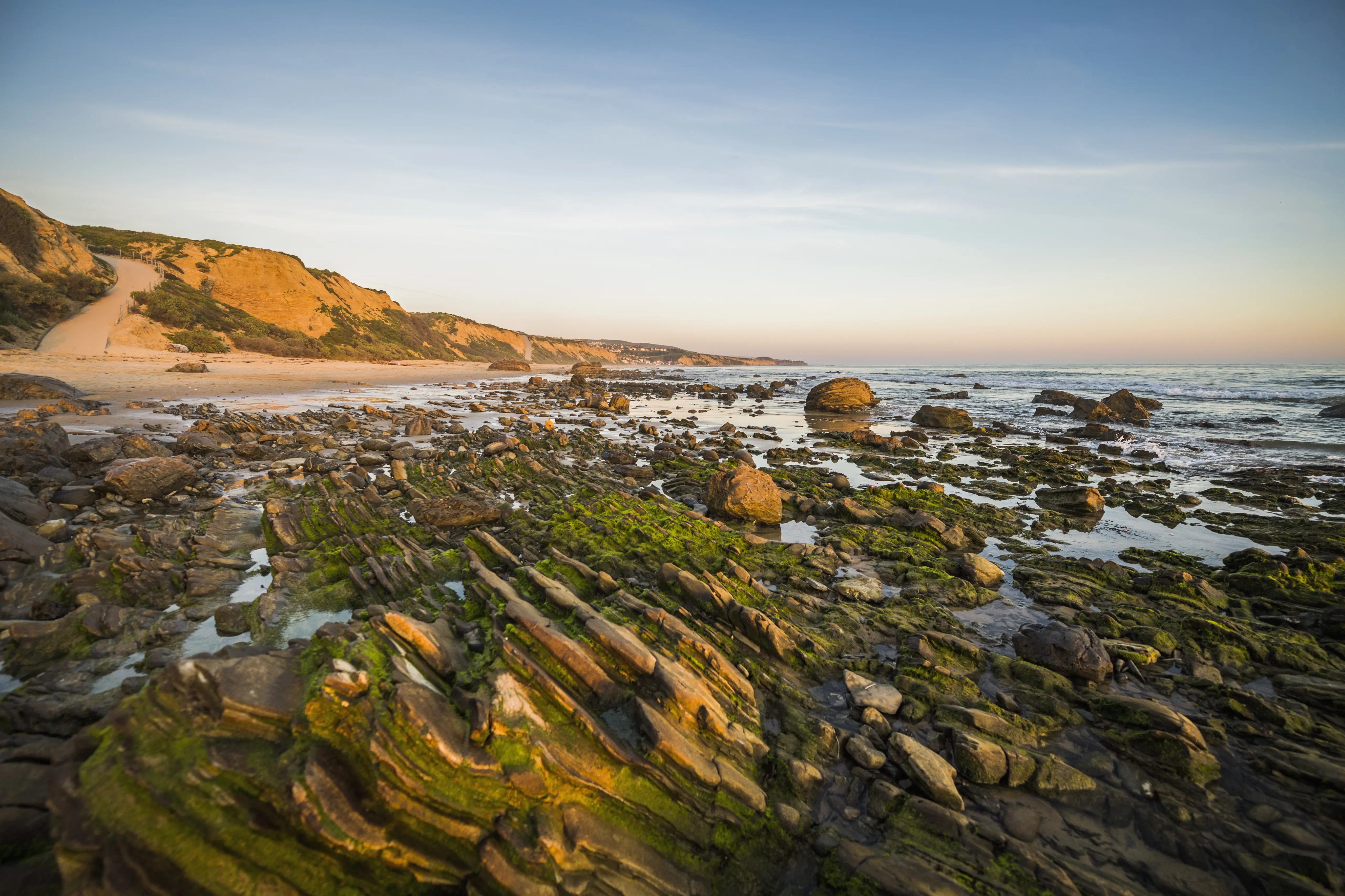 Image of Newport Beach at sunset in Orange County, California.