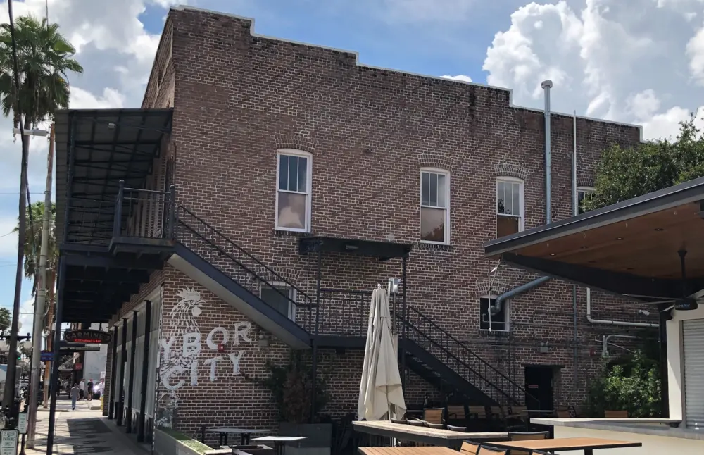 Carmine's mural features a rooster, an homage to the rooster in Ybor City, a National Historic Landmark district in Tampa, FL.