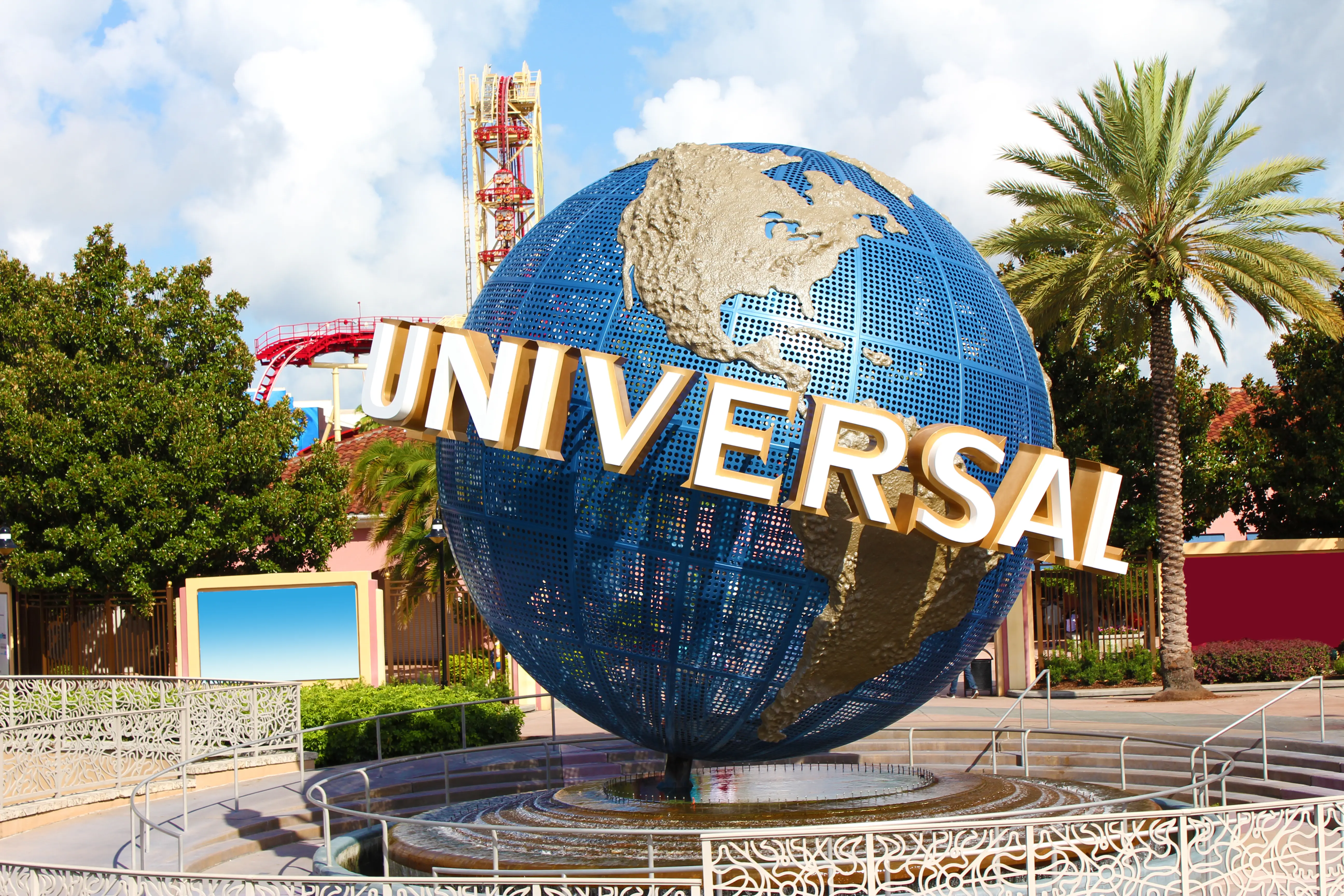 Image of the spinning Universal globe statue at the entrance to Universal Studios Orlando.