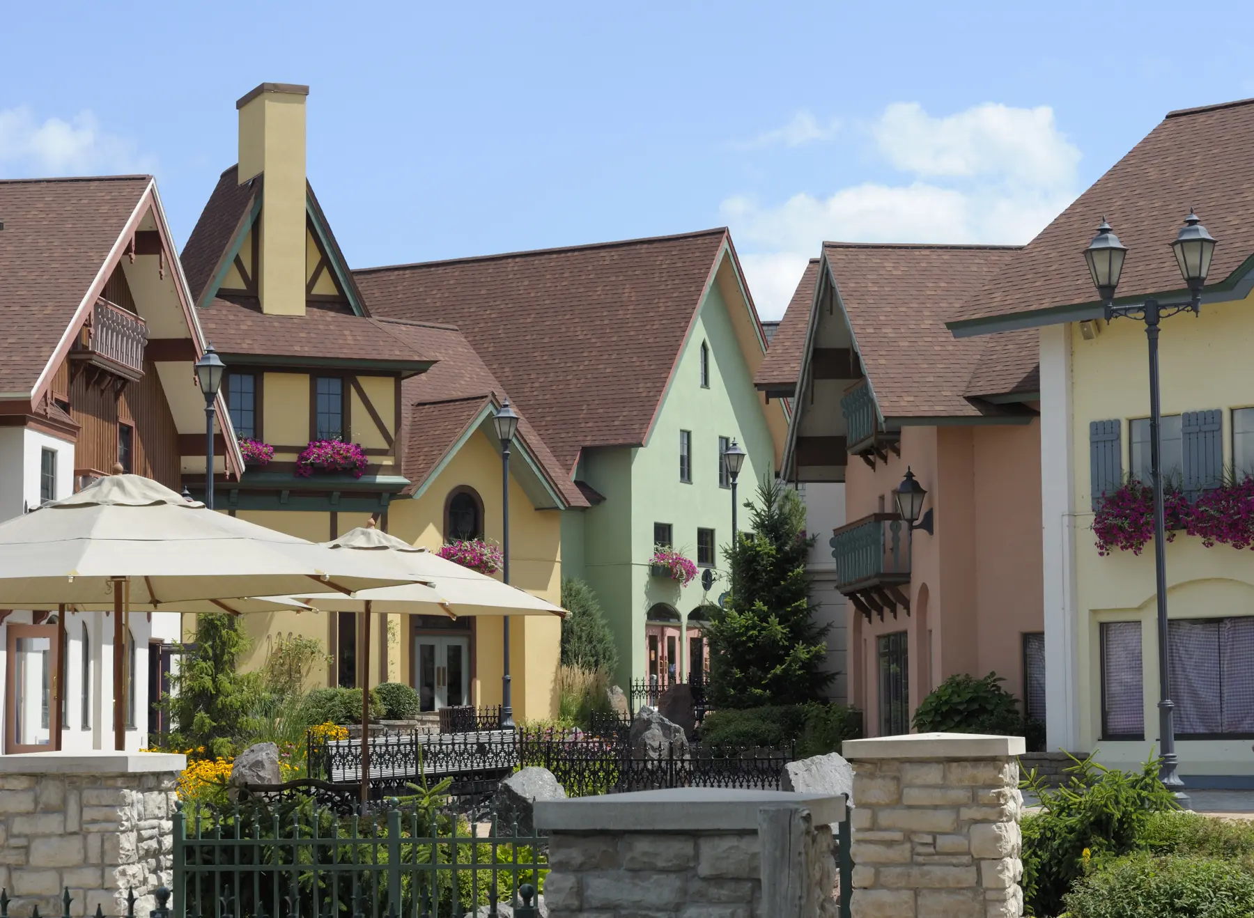 Bavarian style colored buildings and flowers in Frankenmuth Shopping District, Michigan