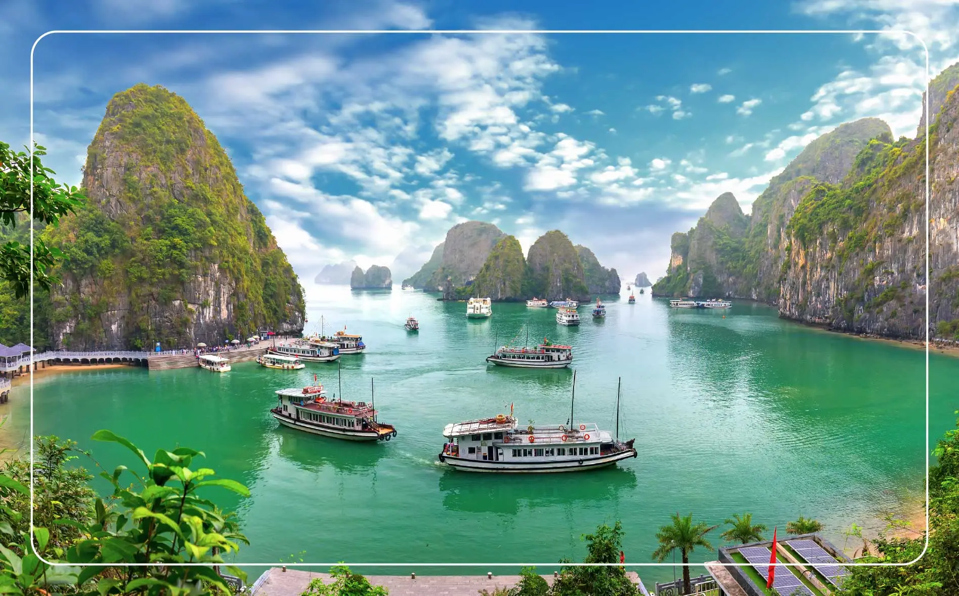 Boats circle the mountainous islands throughout Ha Long Bay.