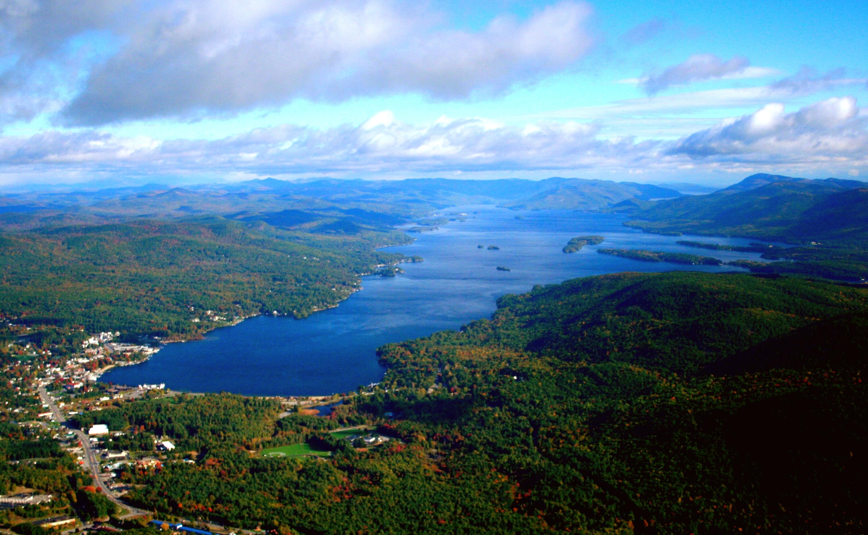 Aerial image of Lake George and its surrounding wilderness landscape.