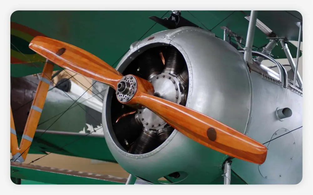 A close-up shot of a propeller on an old plane
