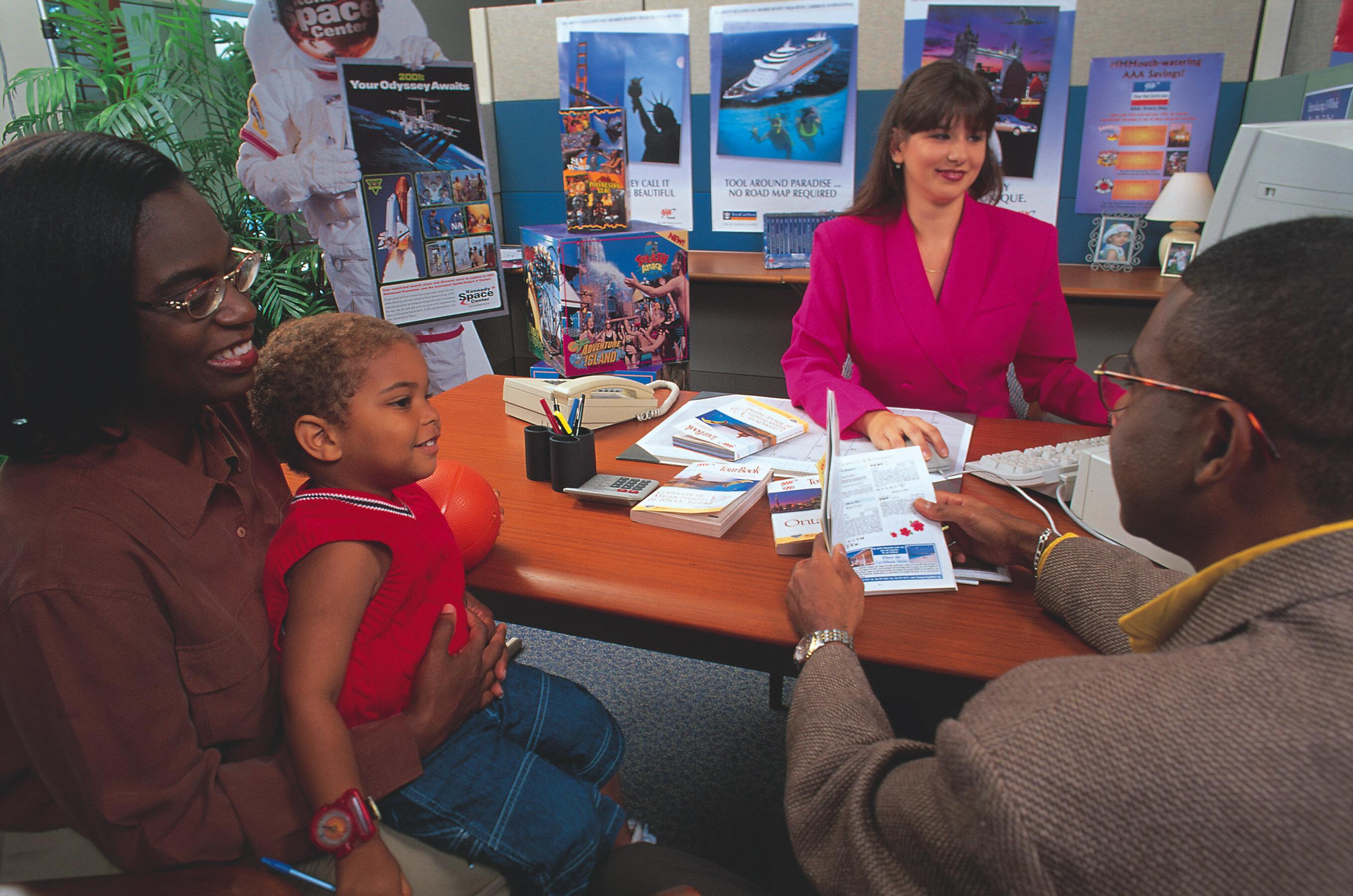 AAA Travel Agent meeting with customers