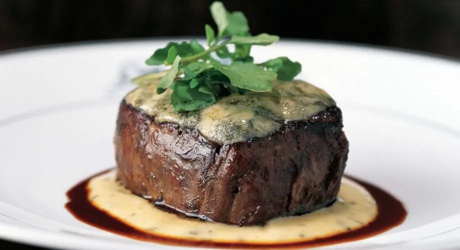 Closeup image of a steak served at Bull & Bear Steakhouse.
