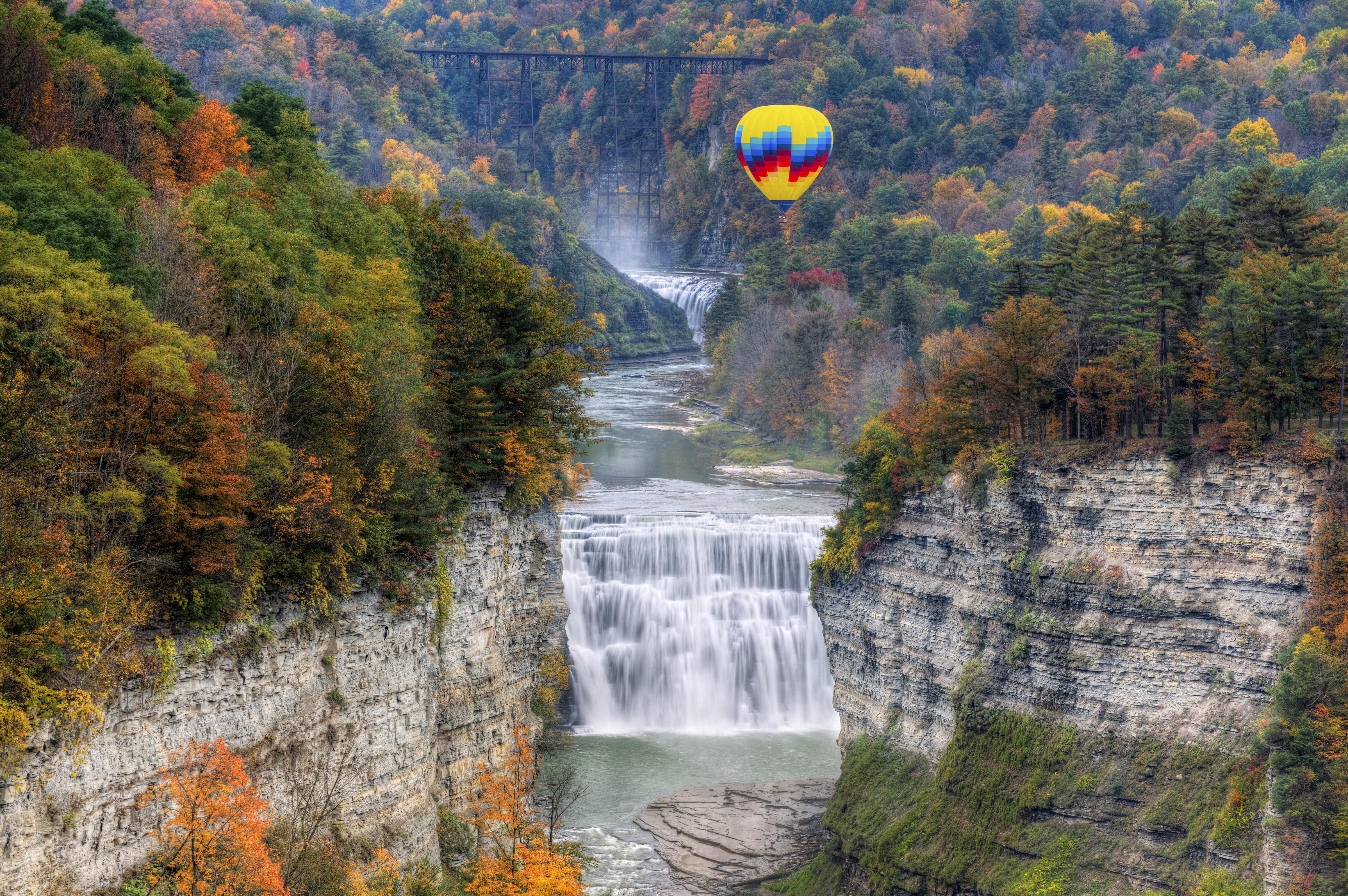 Hot air balloon over The Middle Falls at Letchworth State Park on an autumn day, New York