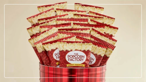 Individual serving bags of popcorn from The Popcorn Factory in a decorative tin makes a great food gift idea.