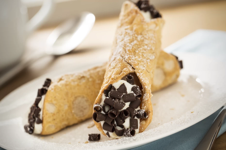 Two cannolis on a plate