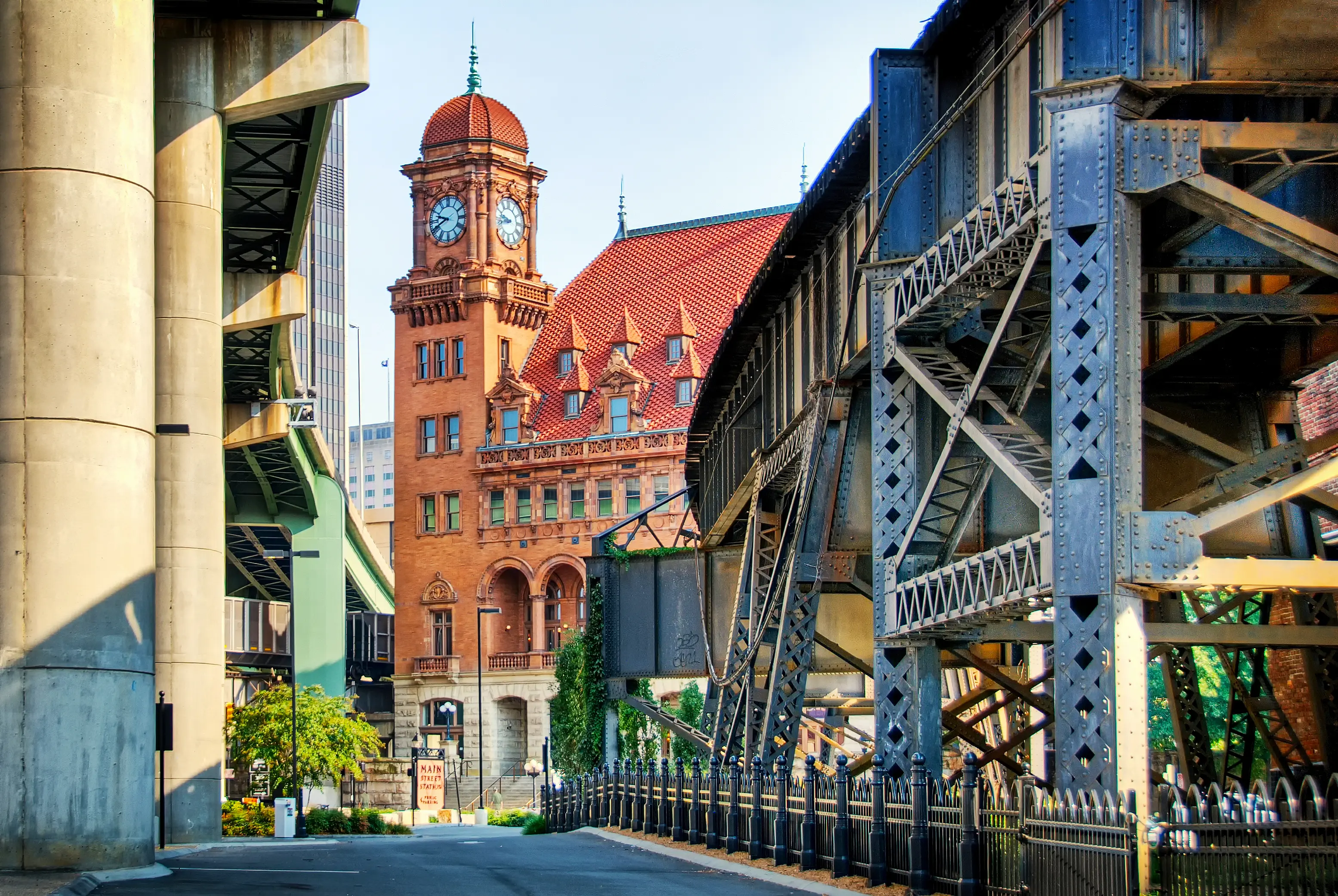 Main Street Station tucked between the elevated double track viaduct and Interstate 95