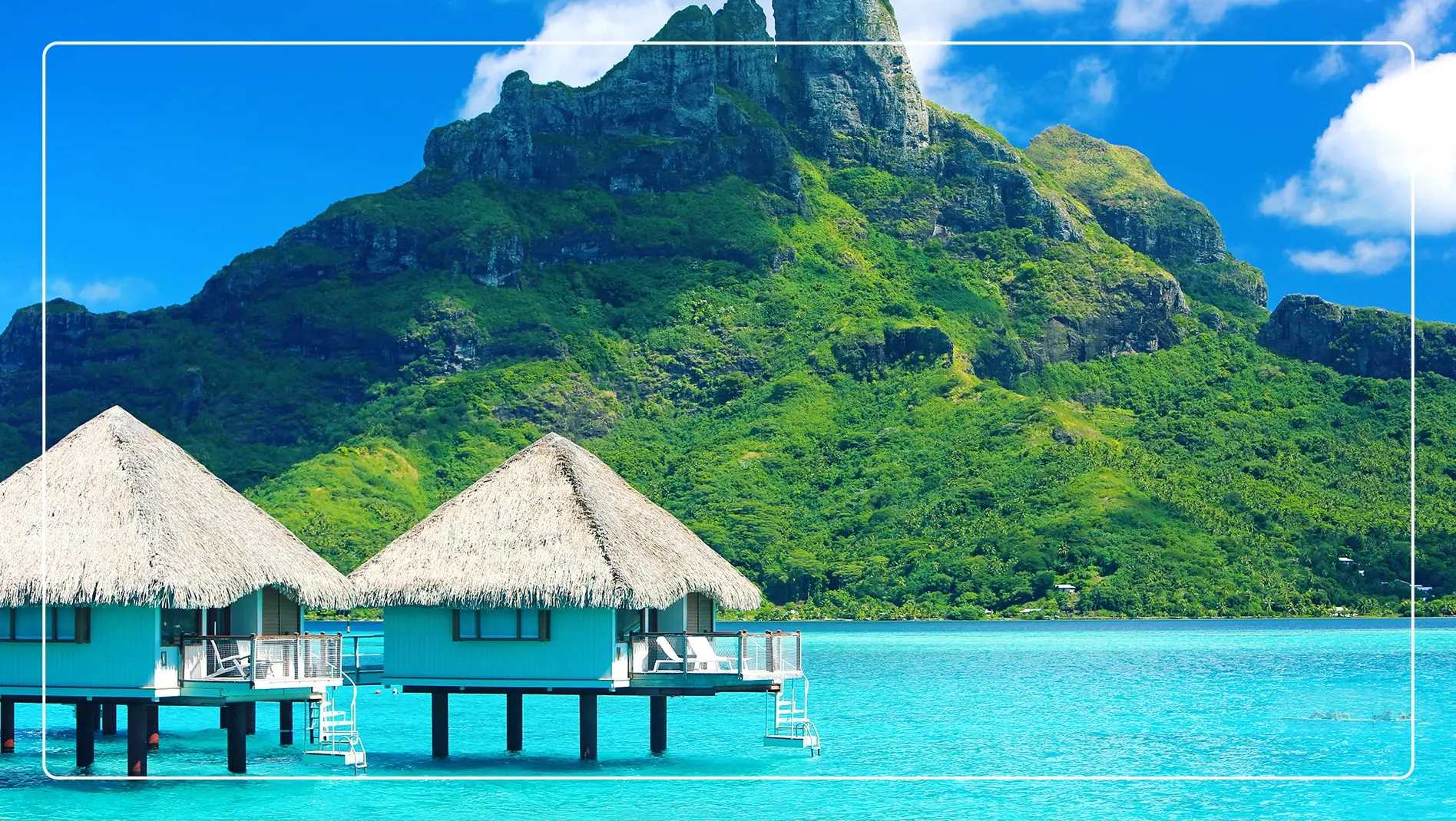 Several bungalows on the water in Bora Bora.