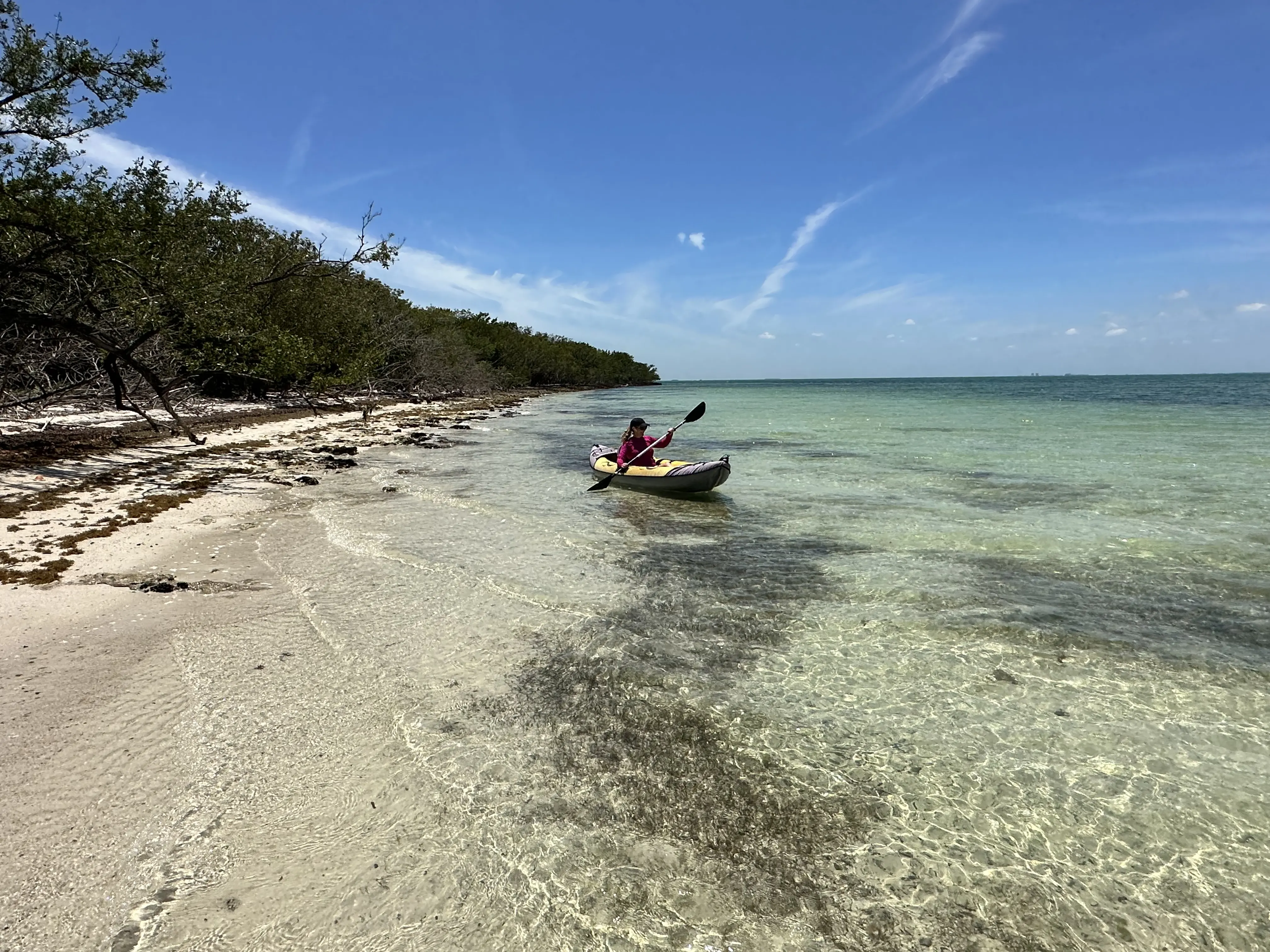 Image of Jennifer Broome paddling in a kayak at Biscayne National Park.
