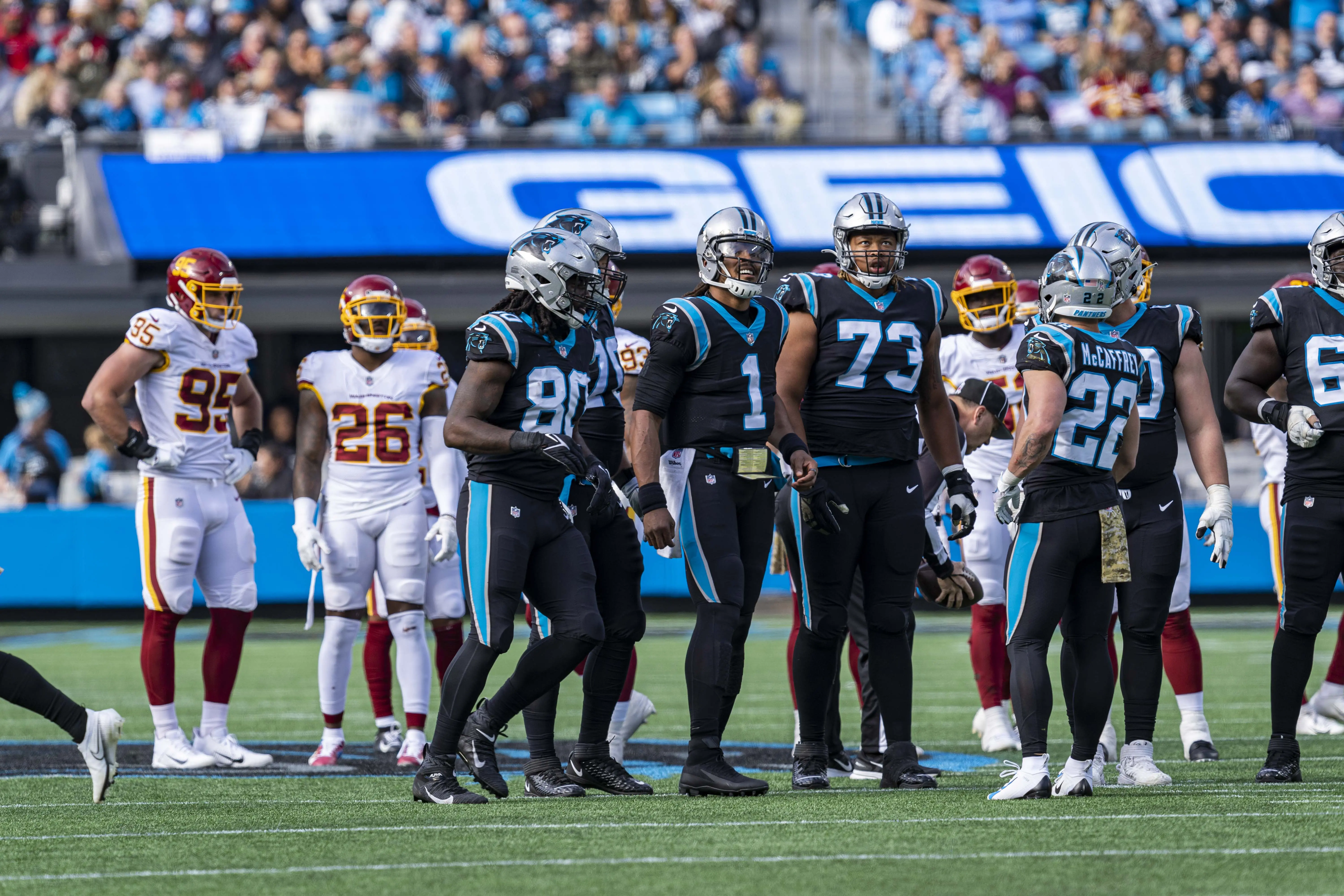 Image of the Carolina Panthers team on-field.