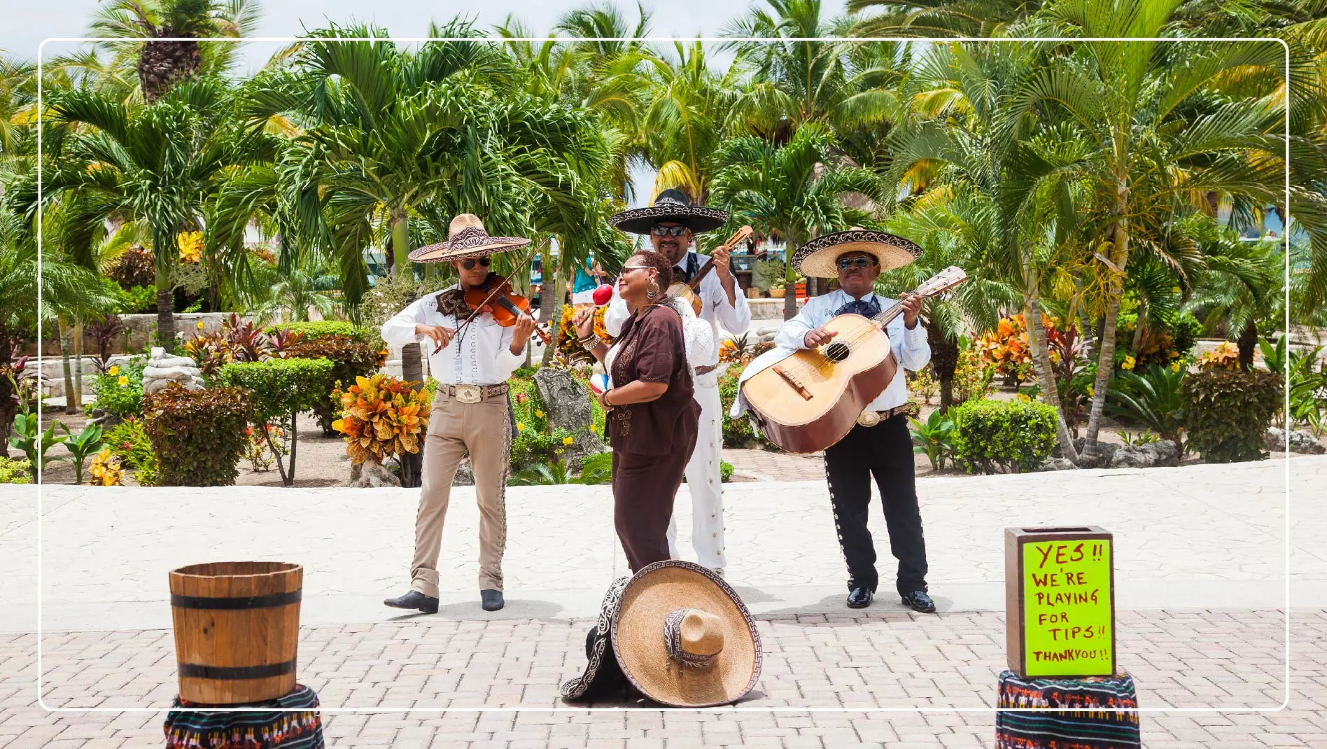 Three mariachi play their instruments in Riviera Maya, Mexico.
