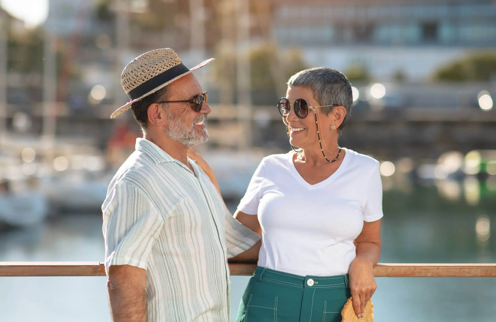 A couple enjoying their company on a river cruise.