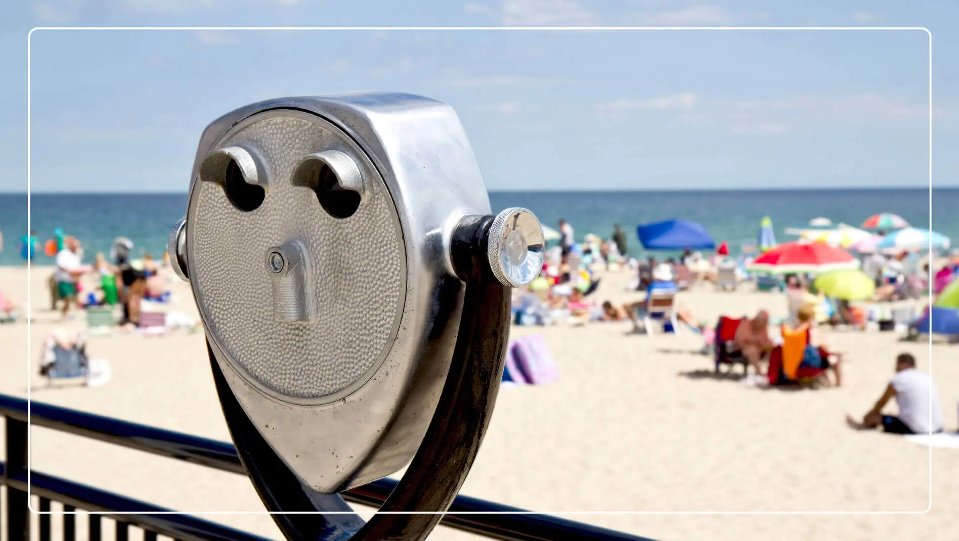 A tower viewer overlooks a busy Hampton Beach.