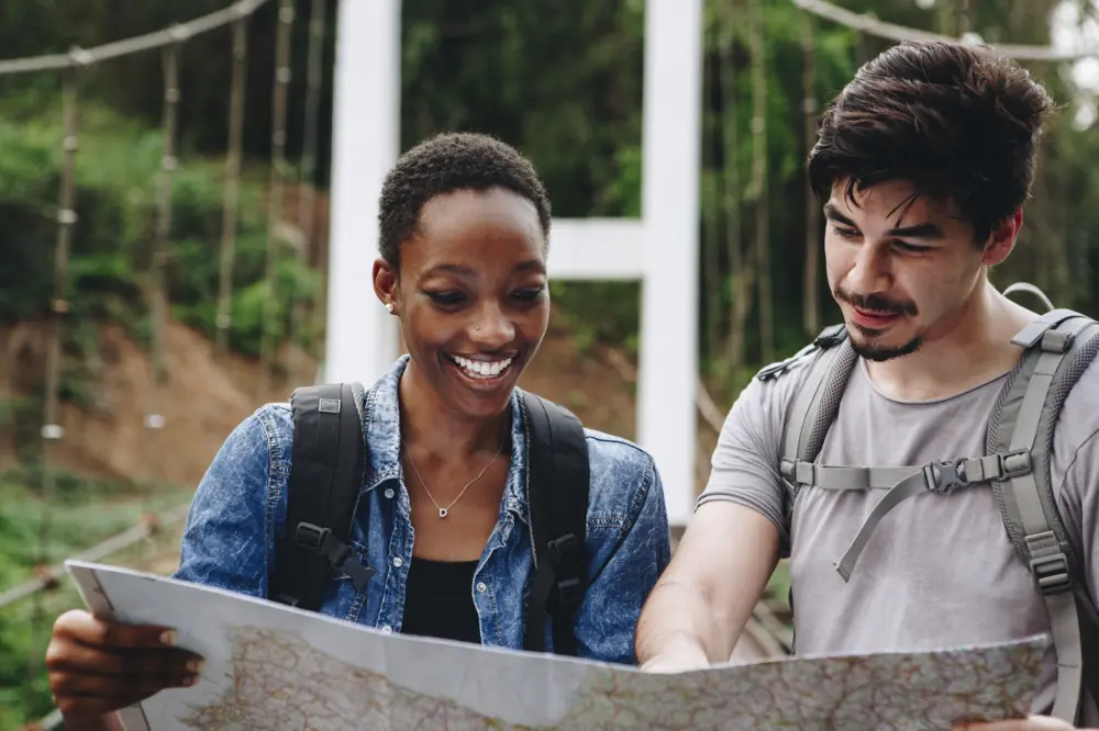 friends looking at map