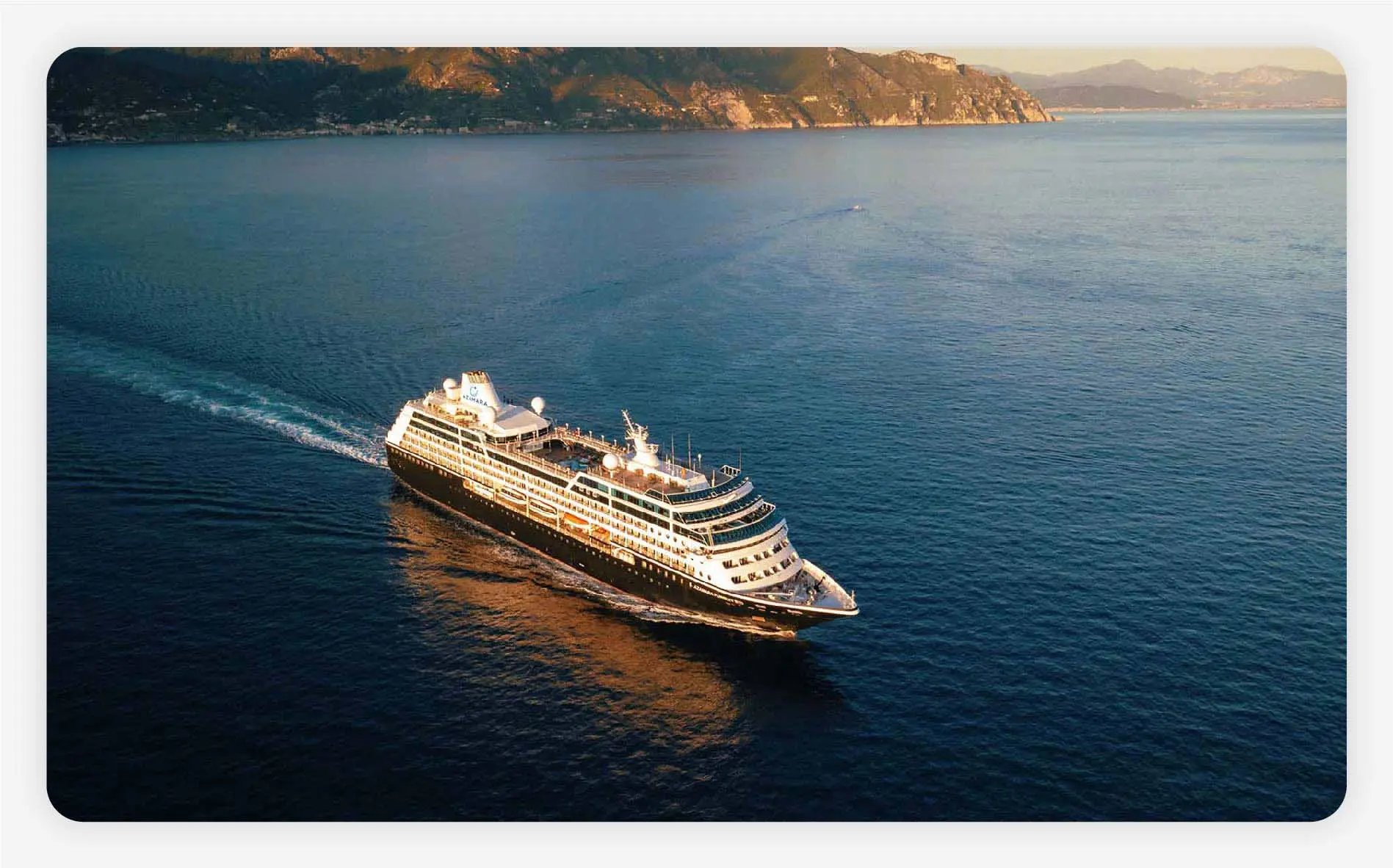 Azamara cruise ship on the water at sunset