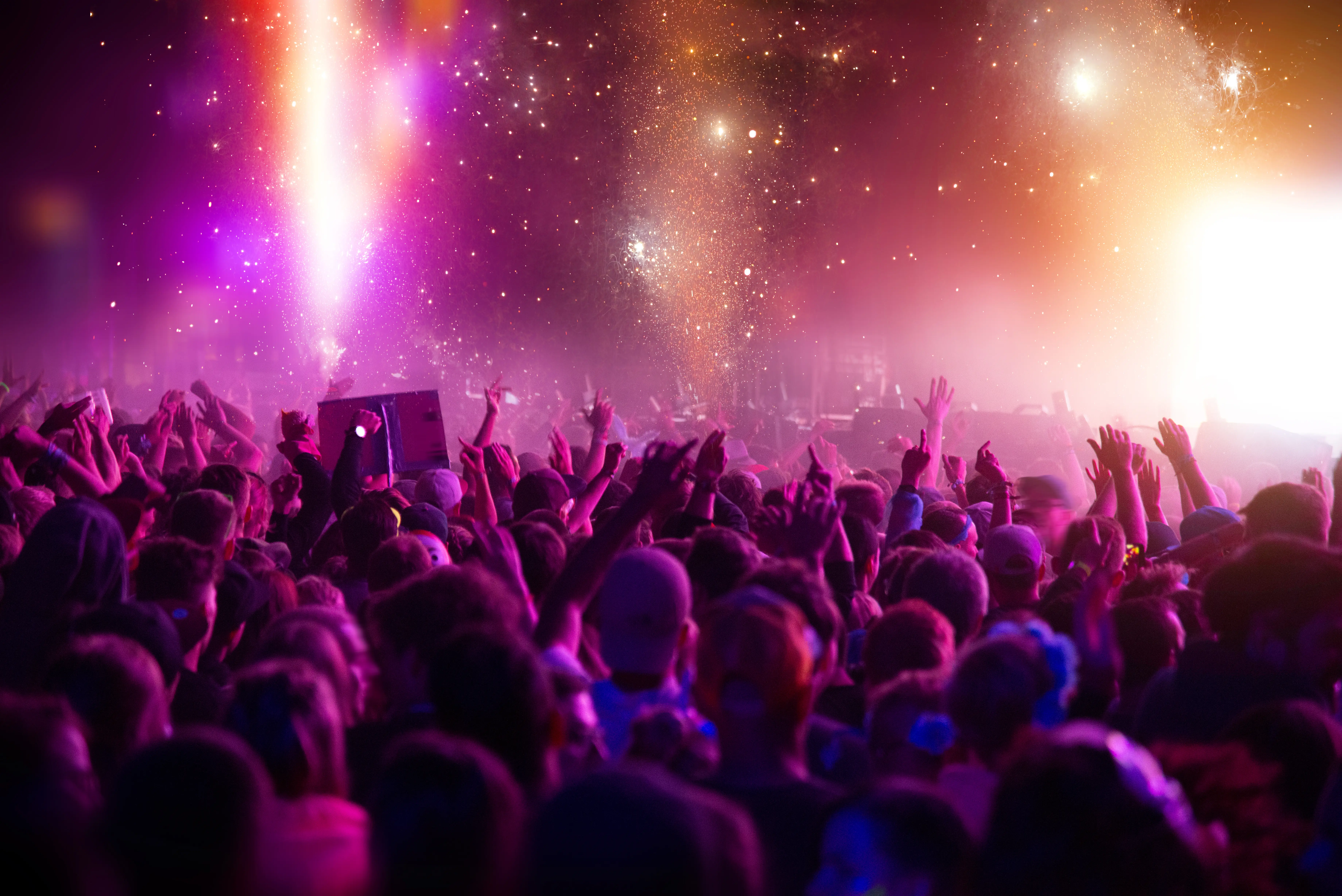 Crowd at a music festival in the evening