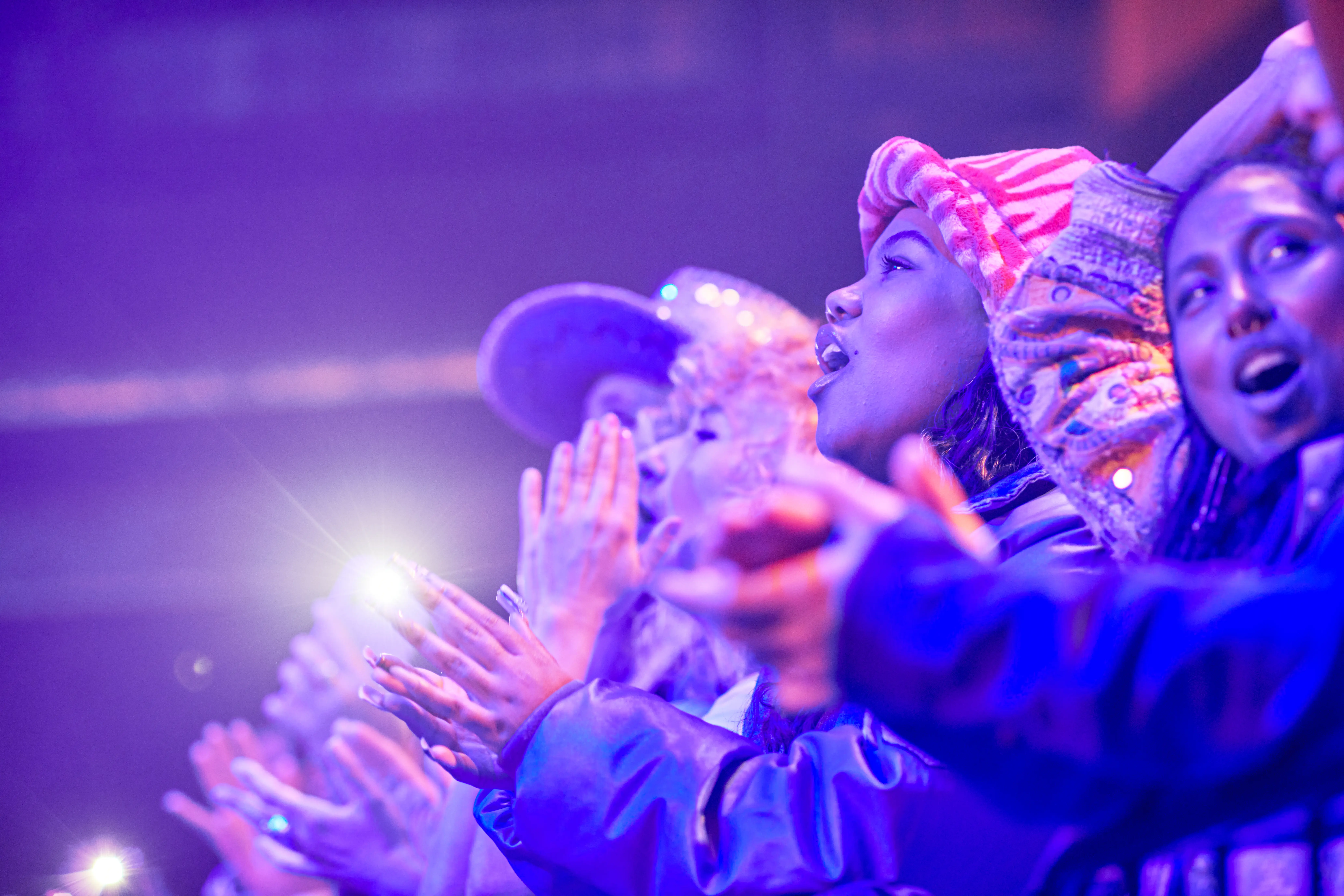 Interior image of a concert crowd