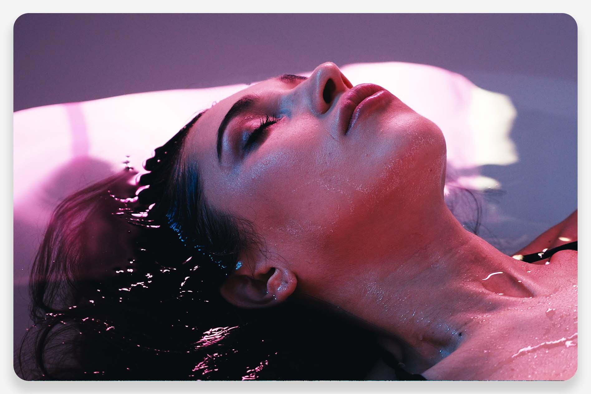 Someone in a sensory deprivation therapy pod