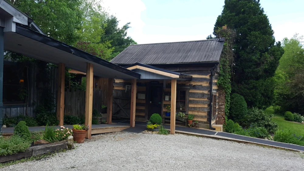 Exterior of The Inn and Spa at Cedar Falls, a rustic inn in Ohio's Hocking Hills area.