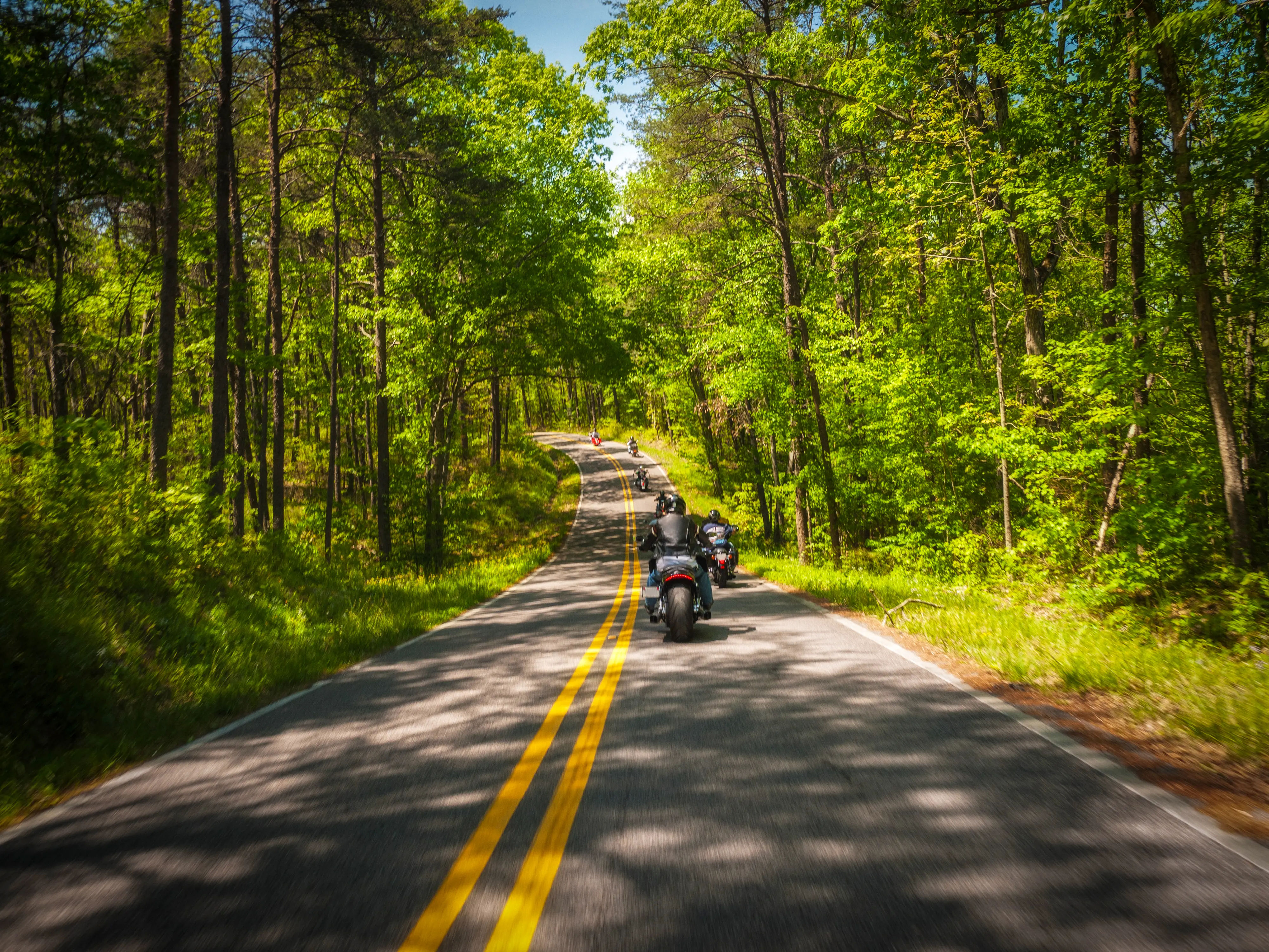 A motorcycle group ride through the countryside